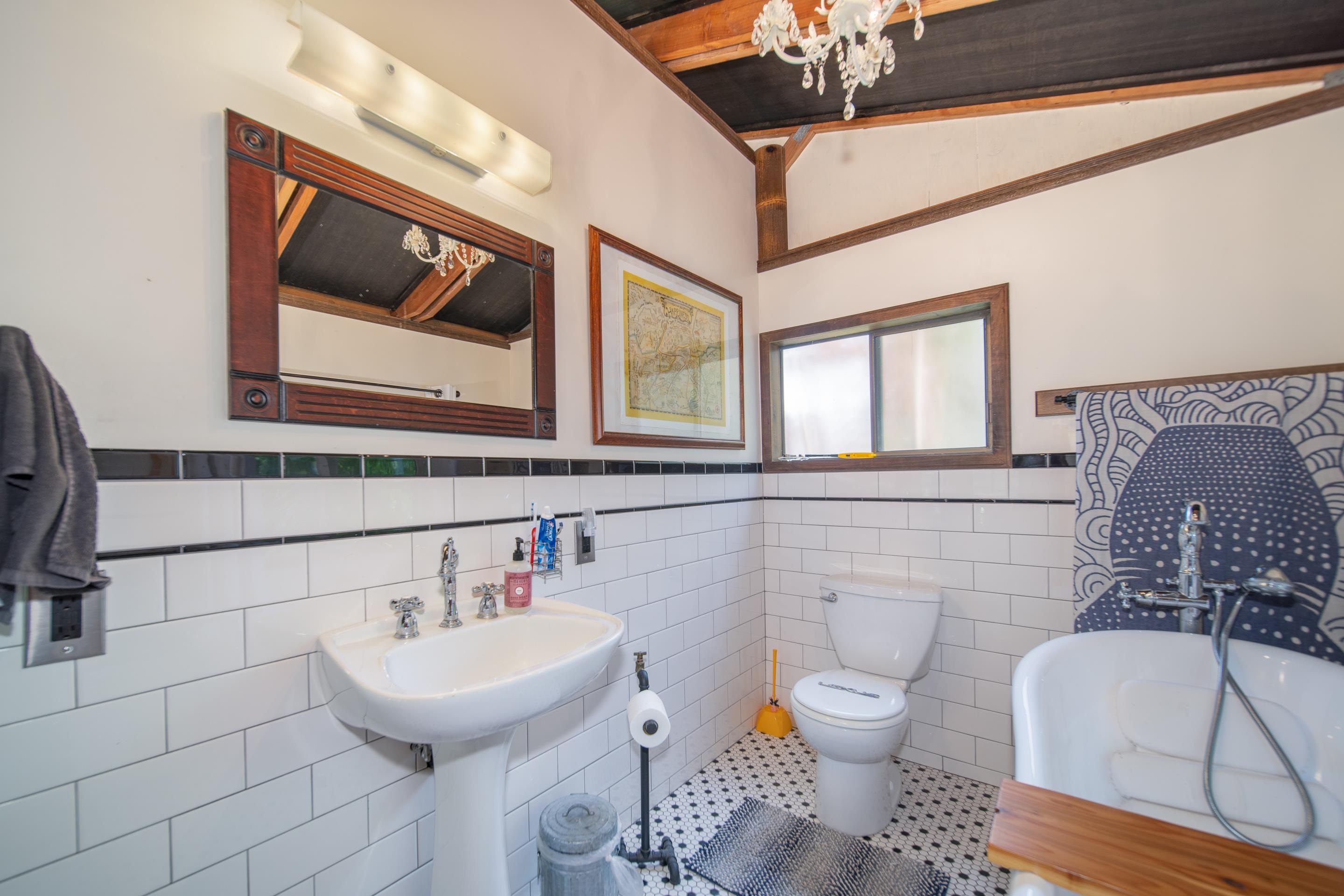 55 Oluolumau Place Haiku, HI 96708 - Photo 30 of 30 a bathroom with a toilet a sink and a mirror