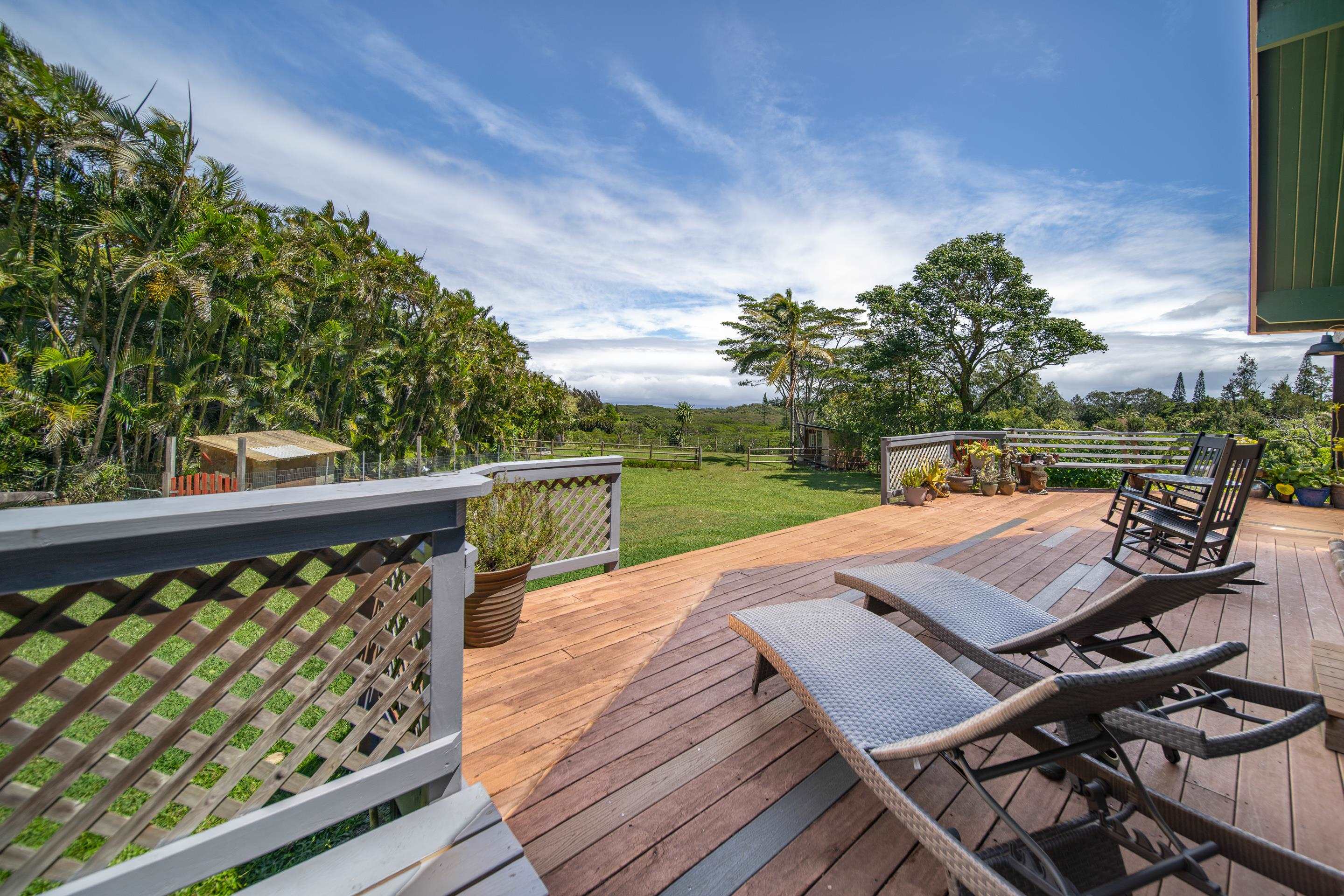 55 Oluolumau Place Haiku, HI 96708 - Photo 9 of 30 a view of a patio with wooden floor