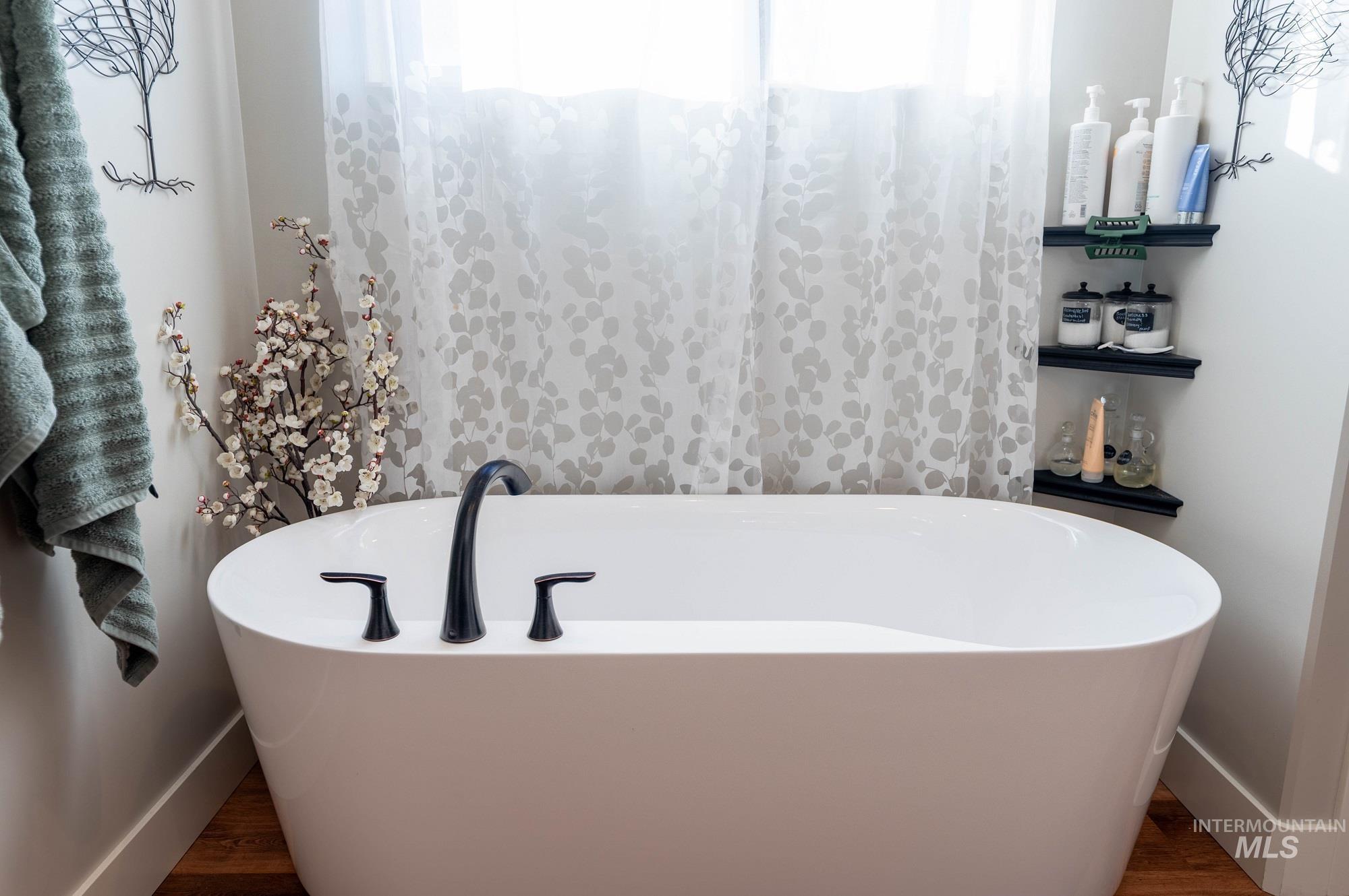 515 School Street Albion, ID 83311 - Photo 13 of 30 Full bath with a freestanding bath and baseboards