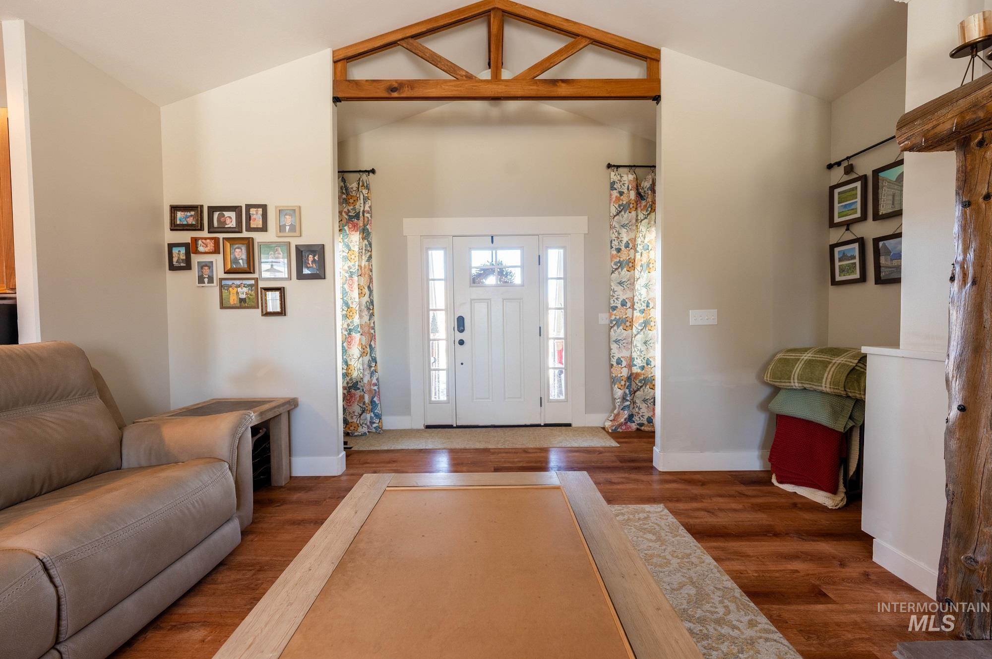 515 School Street Albion, ID 83311 - Photo 2 of 30 Foyer with wood finished floors and vaulted ceiling
