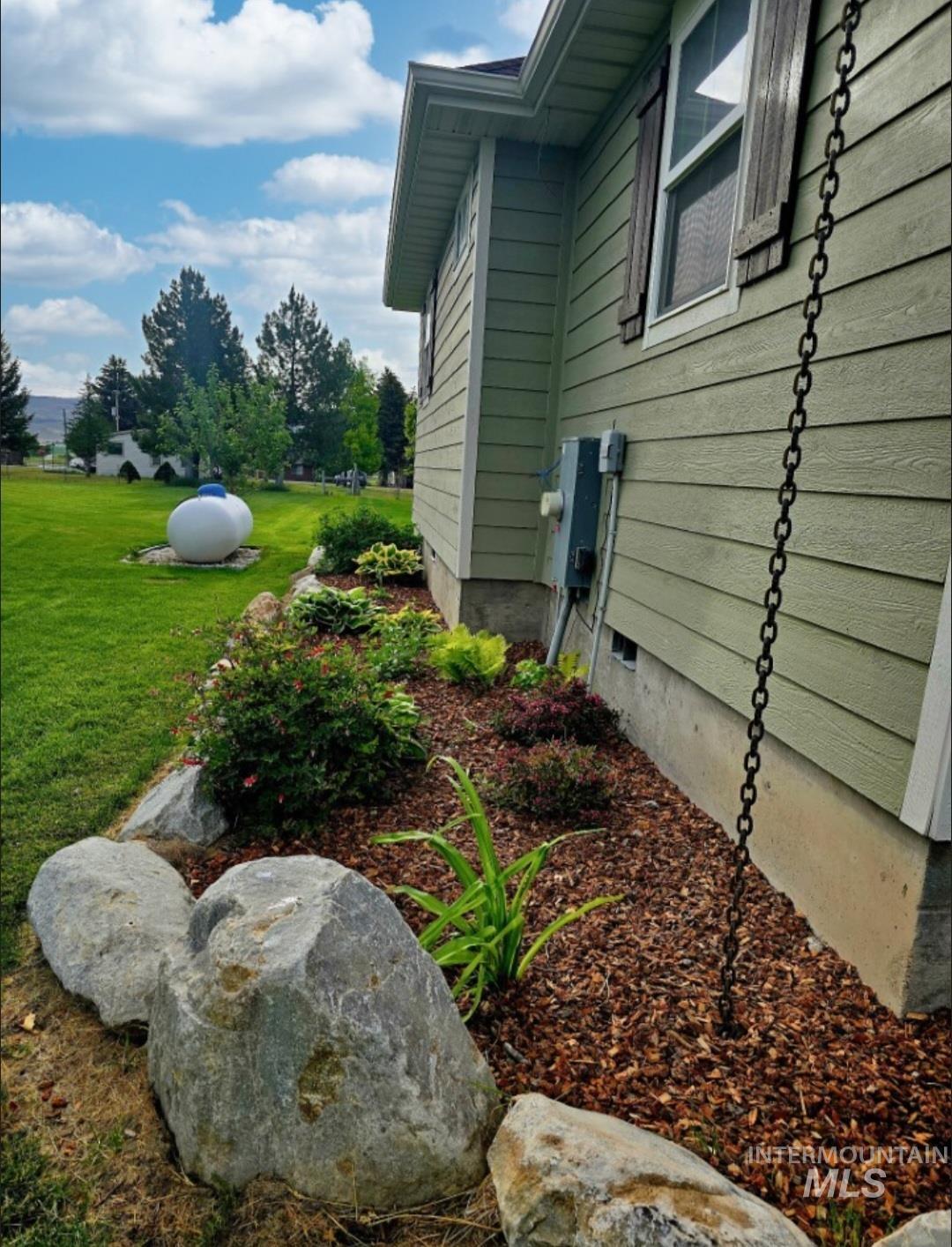 515 School Street Albion, ID 83311 - Photo 25 of 30 View of side of property featuring a yard