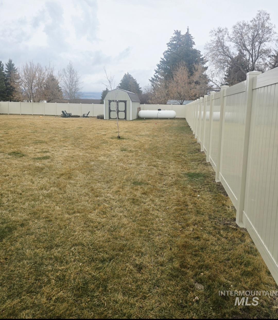 515 School Street Albion, ID 83311 - Photo 27 of 30 Fenced backyard featuring a storage shed