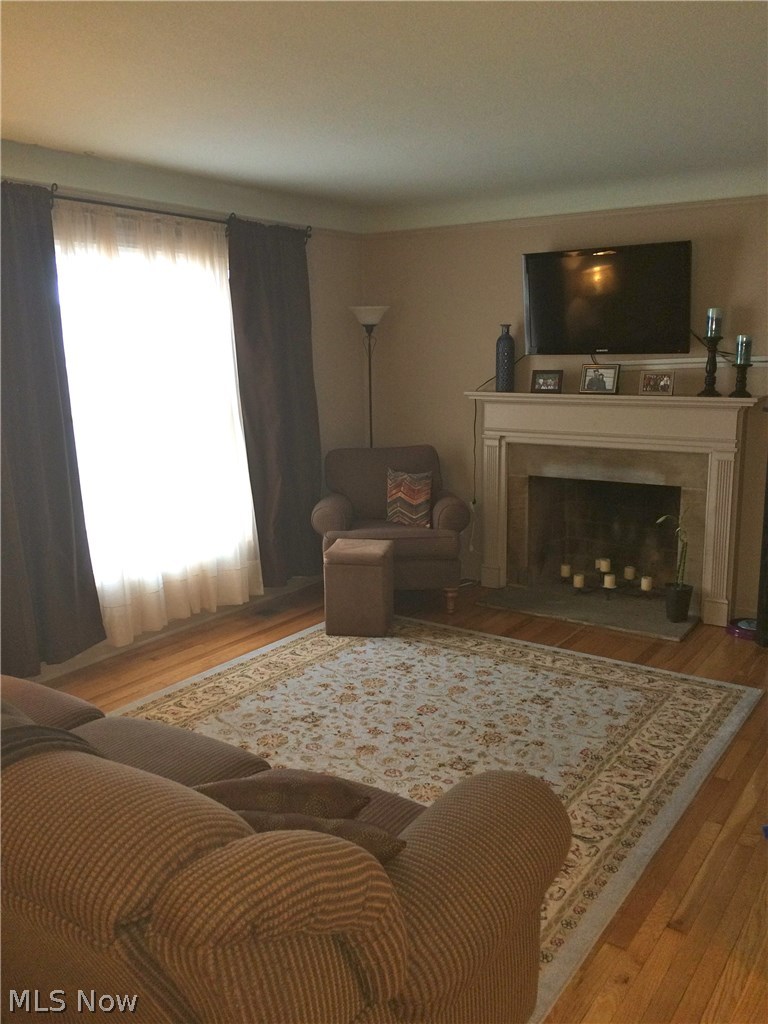 5950 Broadview Road Parma, OH 44134 - Photo 8 of 19 Refinished hardwood flooring, updated windows throughout including in the living room.