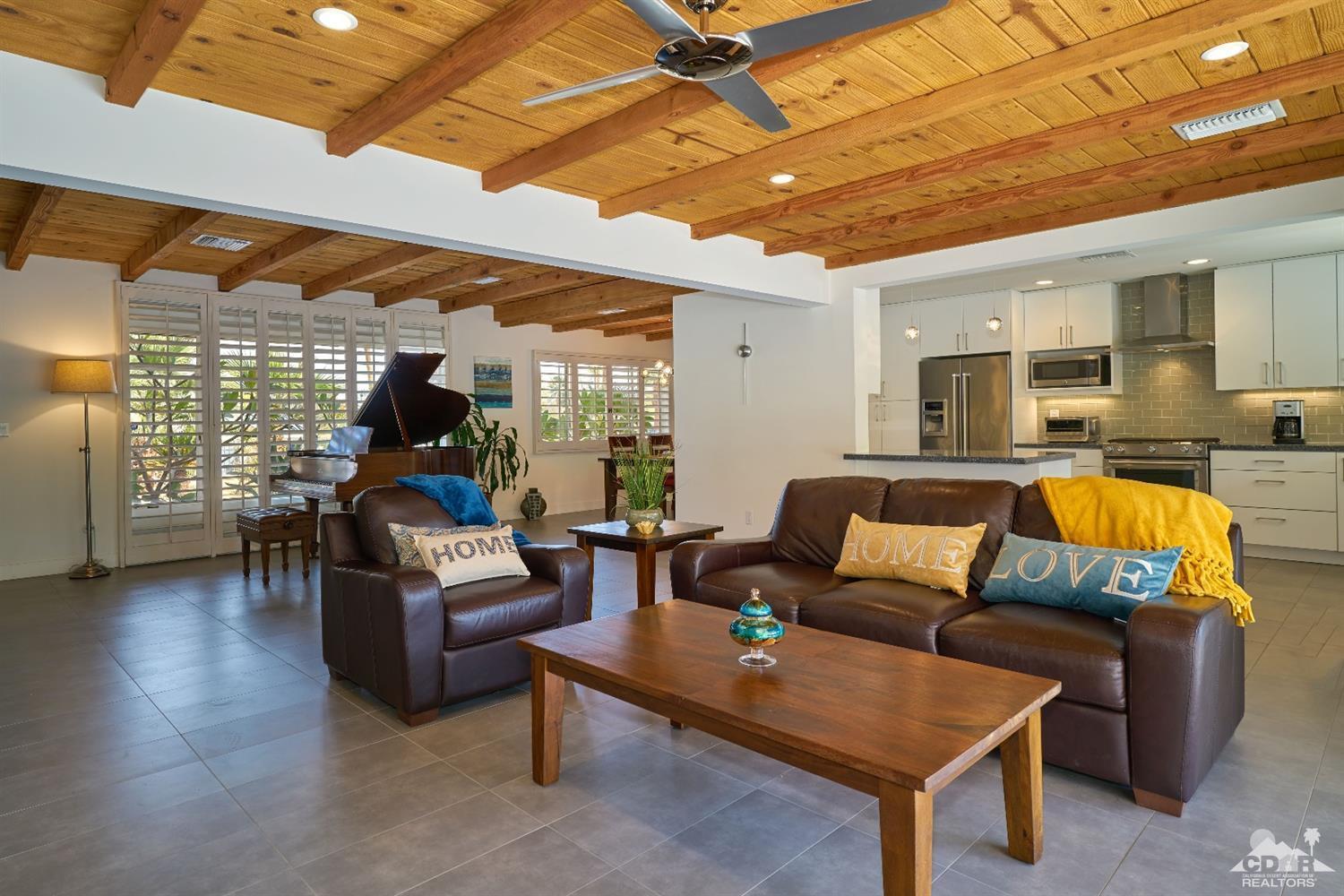 71417 Mirage Road Rancho Mirage, CA 92270 - Photo 14 of 25 a living room with furniture and a large window