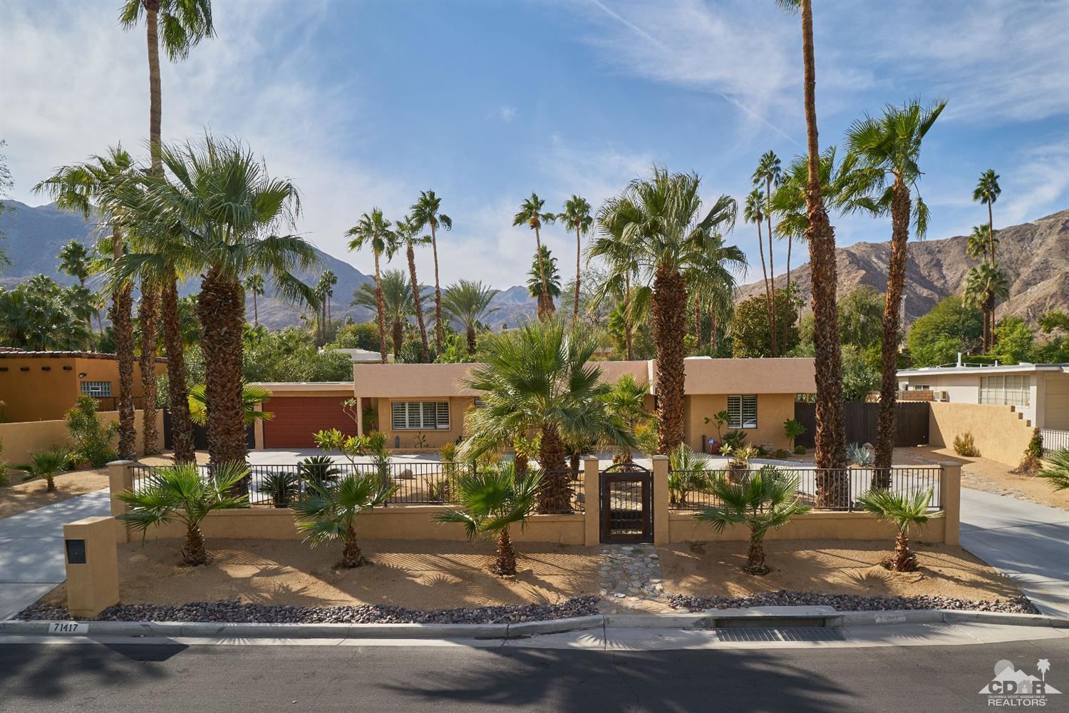 71417 Mirage Road Rancho Mirage, CA 92270 - Photo 2 of 25 a view of a street with cars