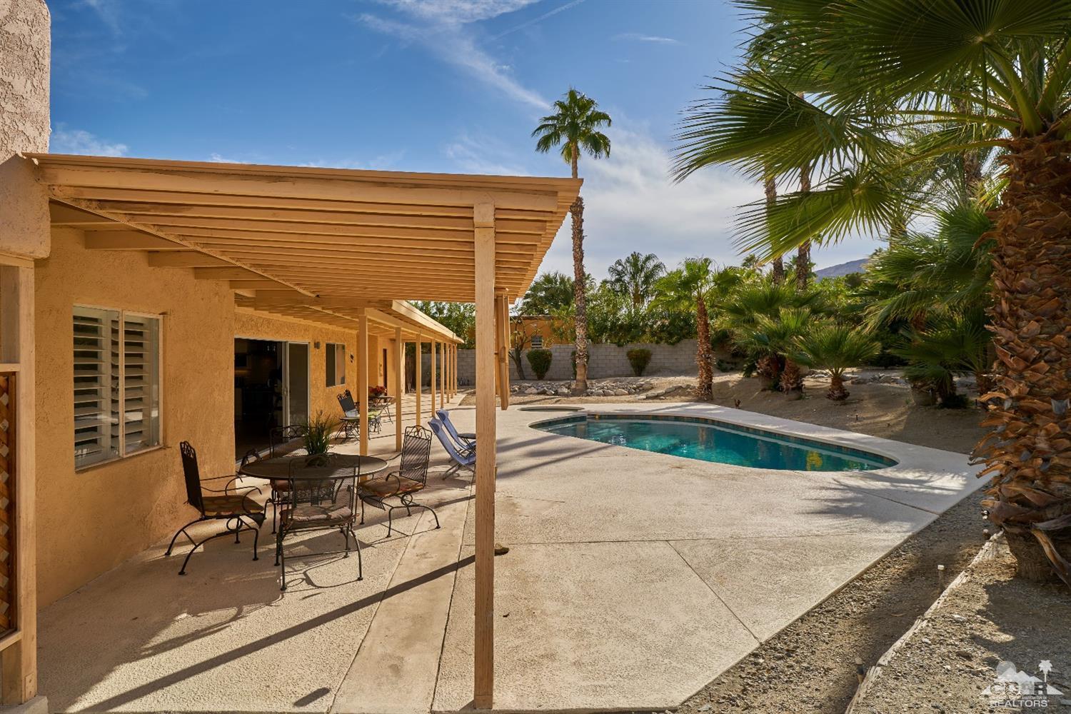 71417 Mirage Road Rancho Mirage, CA 92270 - Photo 24 of 25 a view of a house with backyard and sitting area