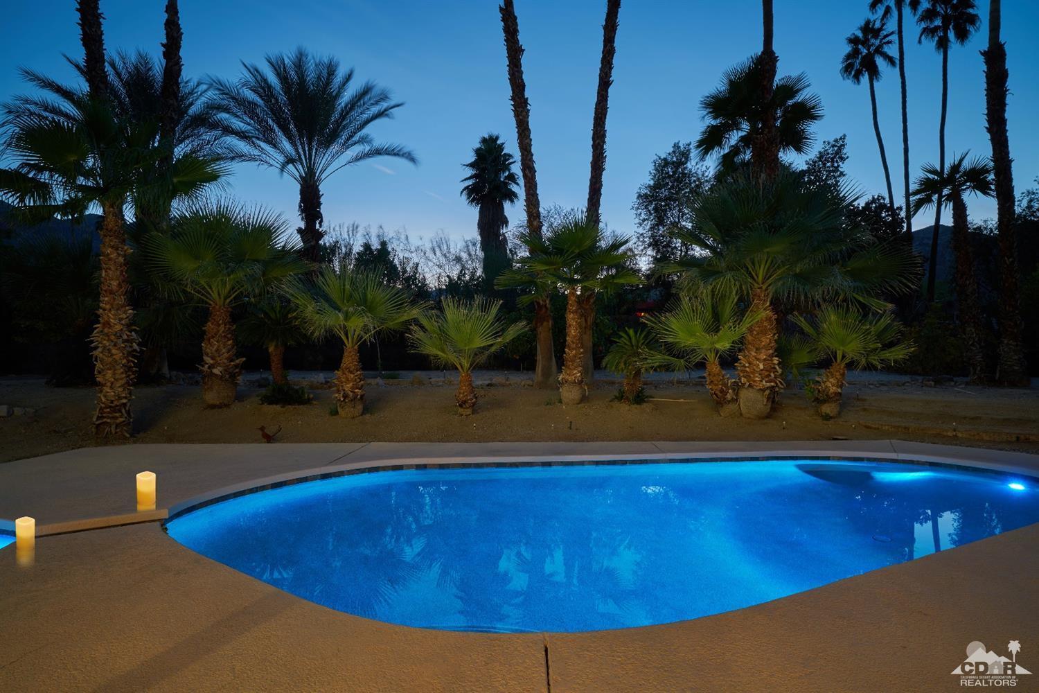 71417 Mirage Road Rancho Mirage, CA 92270 - Photo 9 of 25 a view of a swimming pool with a house