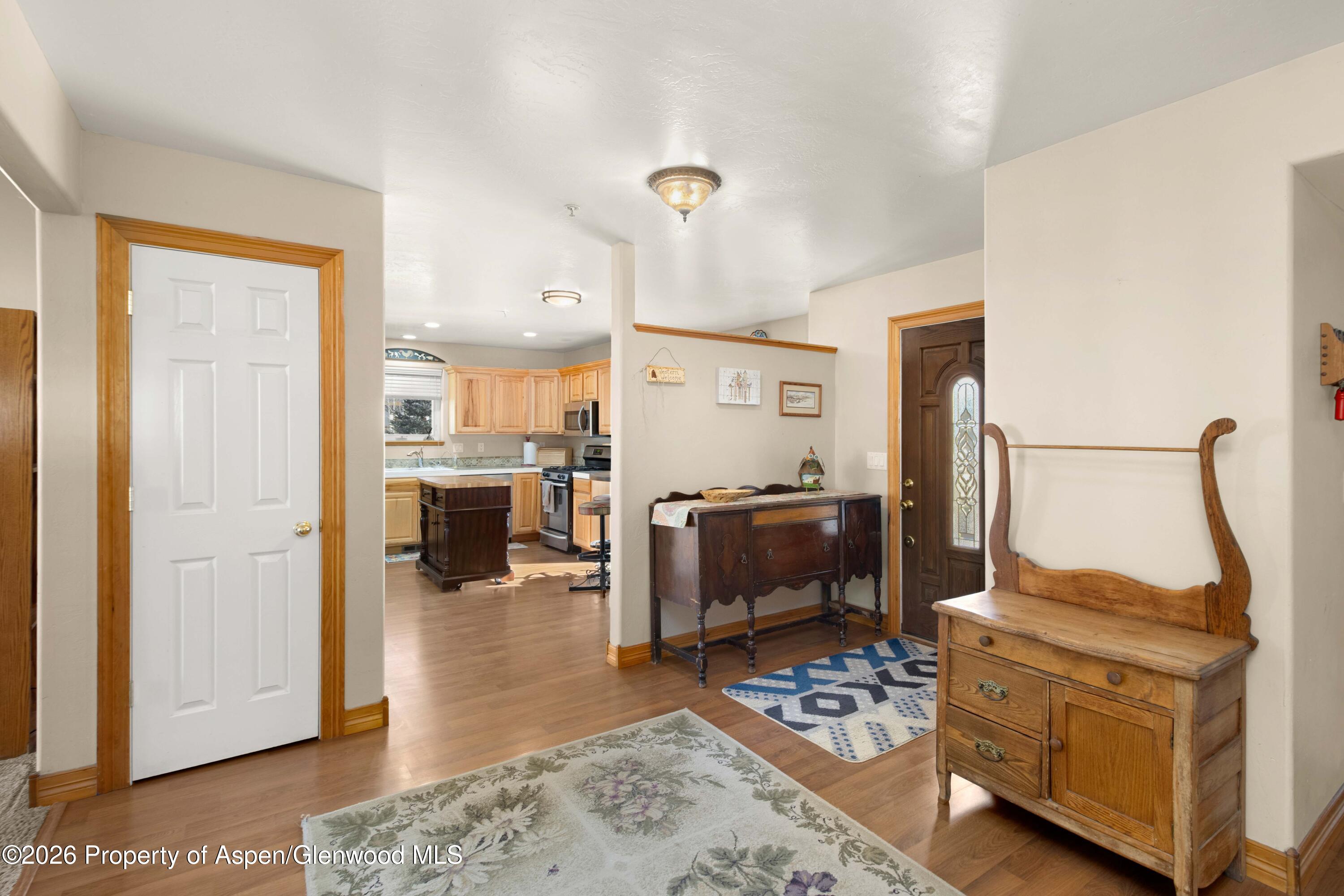 83 Native Springs Drive Rifle, CO 81650 - Photo 14 of 31 a view of living room and kitchen