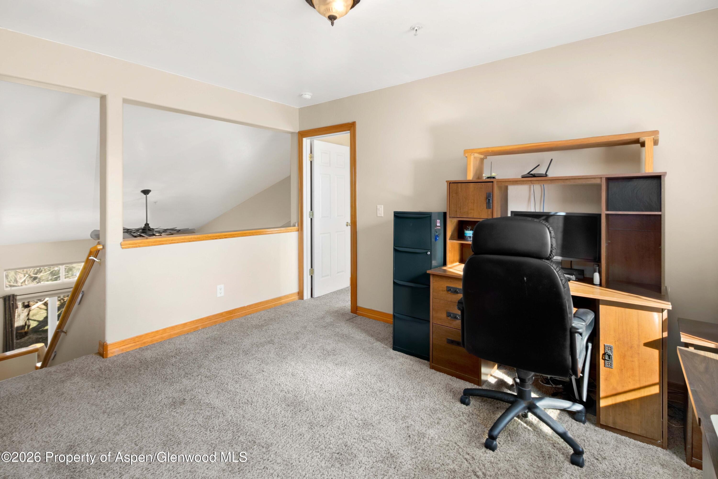 83 Native Springs Drive Rifle, CO 81650 - Photo 19 of 31 a view of workspace with windows