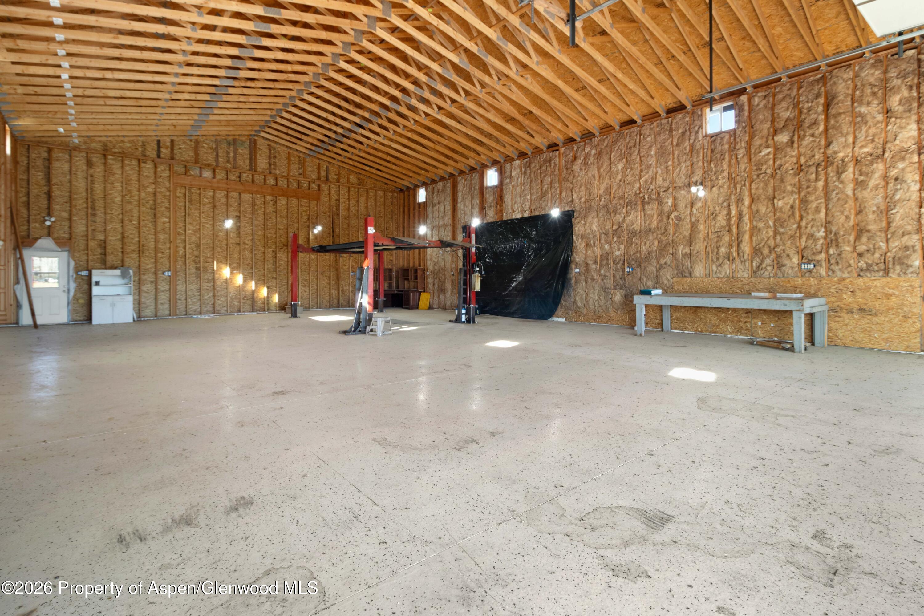 83 Native Springs Drive Rifle, CO 81650 - Photo 25 of 31 a view of a big room with wooden stairs