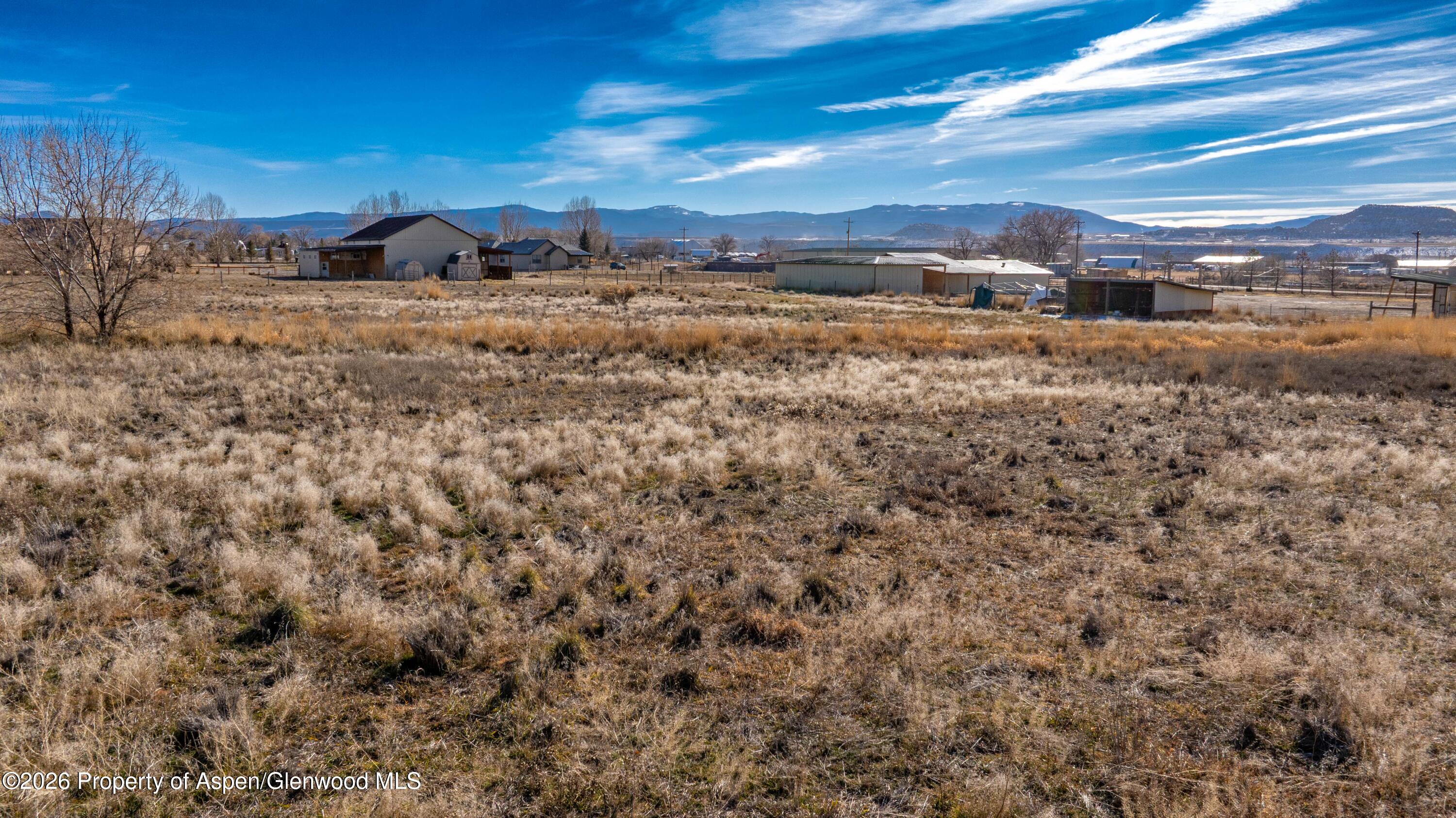83 Native Springs Drive Rifle, CO 81650 - Photo 30 of 31 a view of a yard with an outdoor space