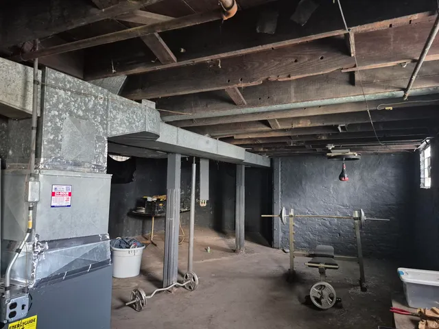 a kitchen with a stove and a refrigerator