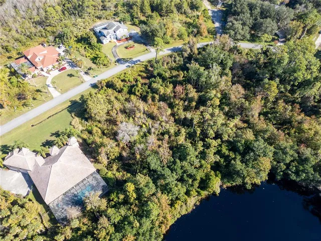 an aerial view of residential house with outdoor space