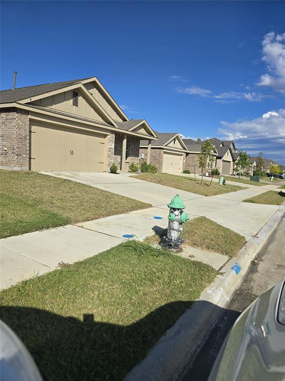 14017 Ilderton Street Pilot Point, TX 76258 - Photo 17 of 22 a view of a street with an ocean view