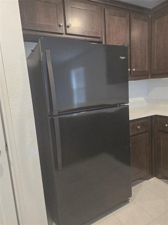 14017 Ilderton Street Pilot Point, TX 76258 - Photo 7 of 22 a close view of a refrigerator in kitchen