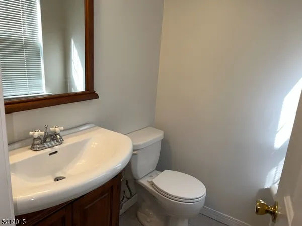 a bathroom with a sink and a toilet