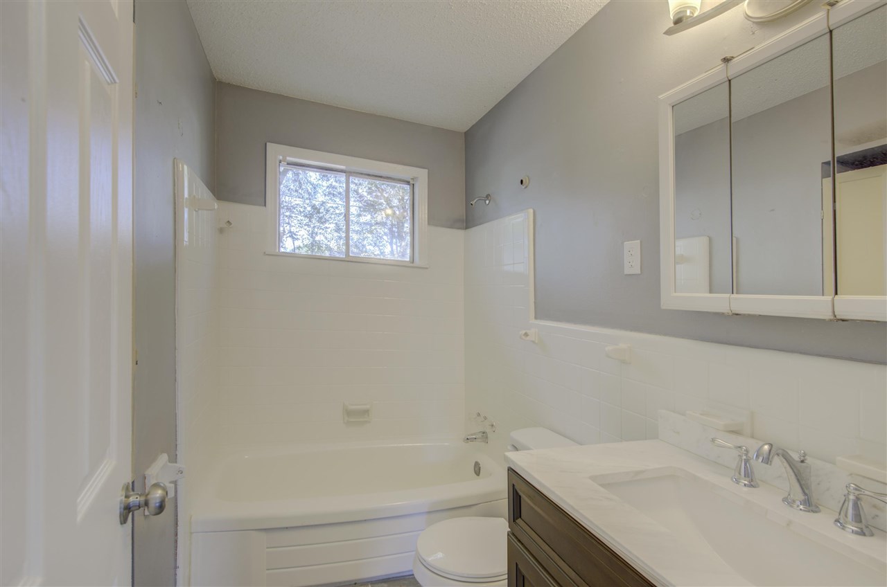 3574 Carrington Road Memphis, TN 38111 - Photo 12 of 22 a bathroom with a sink toilet and shower