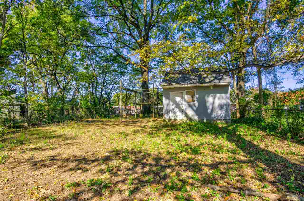 3574 Carrington Road Memphis, TN 38111 - Photo 19 of 22 a view of a yard with plants and trees