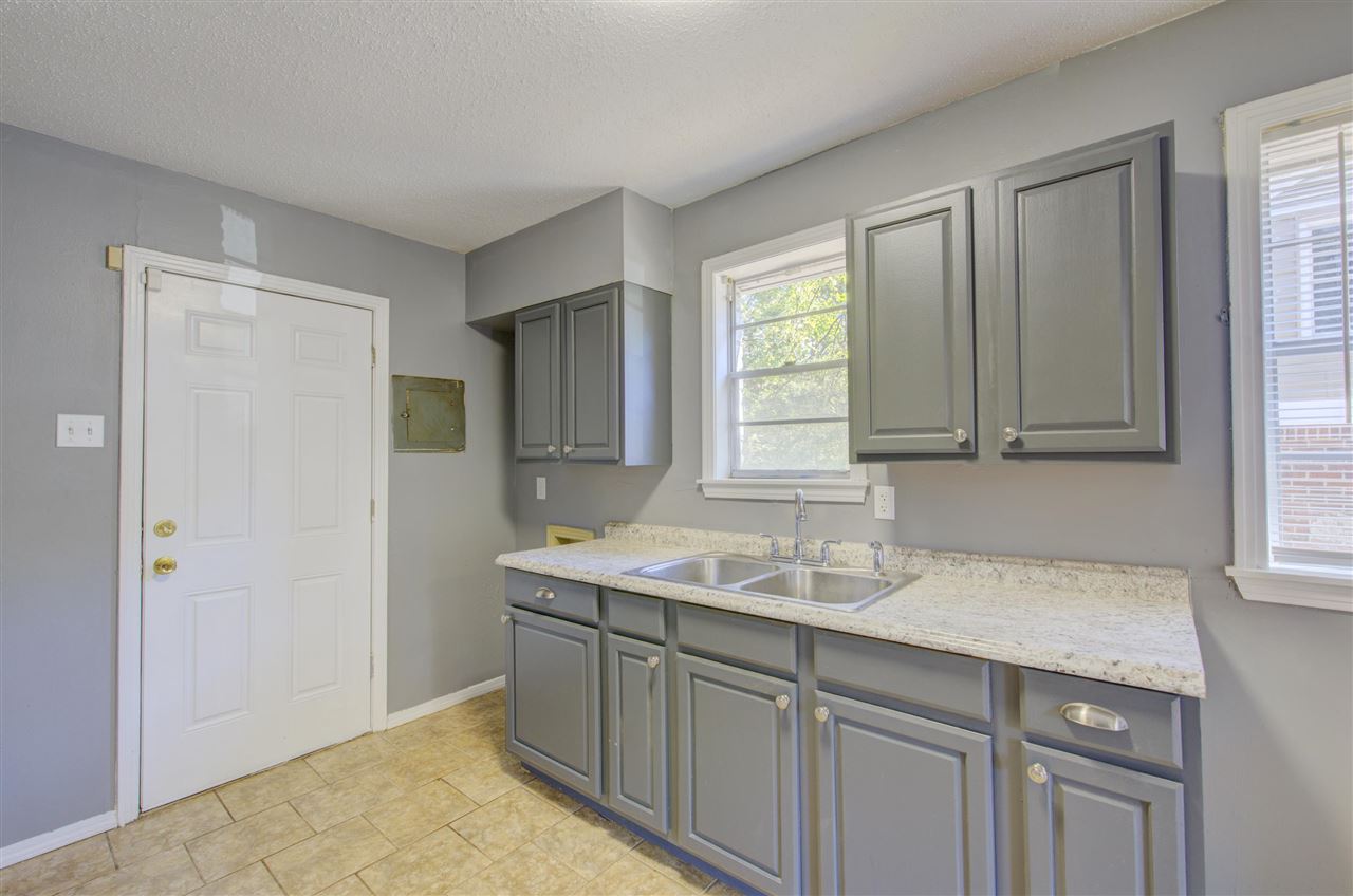 3574 Carrington Road Memphis, TN 38111 - Photo 9 of 22 a bathroom with a sink and a mirror