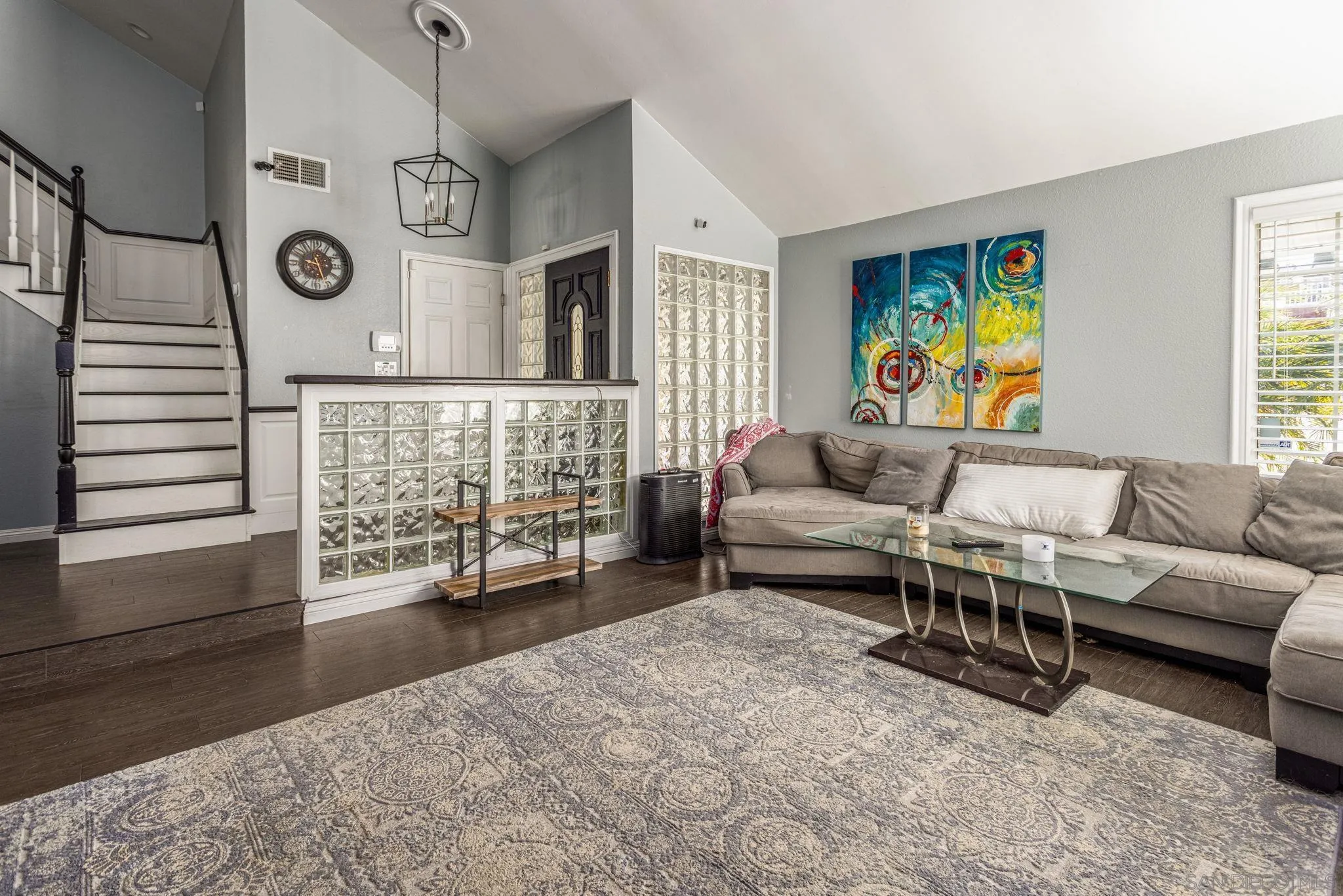 532 Kempton Street Spring Valley, CA 91977 - Photo 5 of 30 a living room with furniture and a wooden floor
