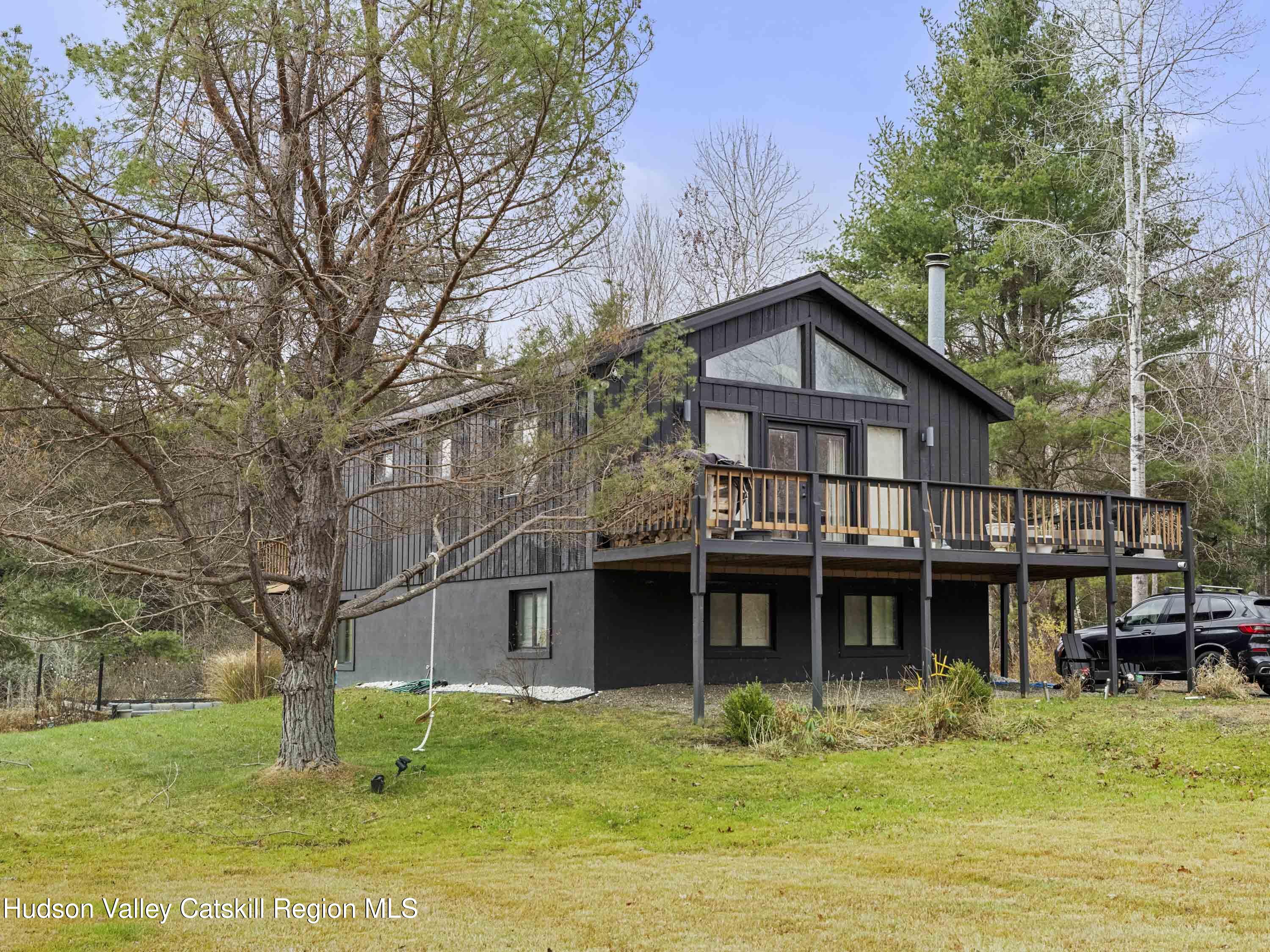 a view of a house with a swimming pool