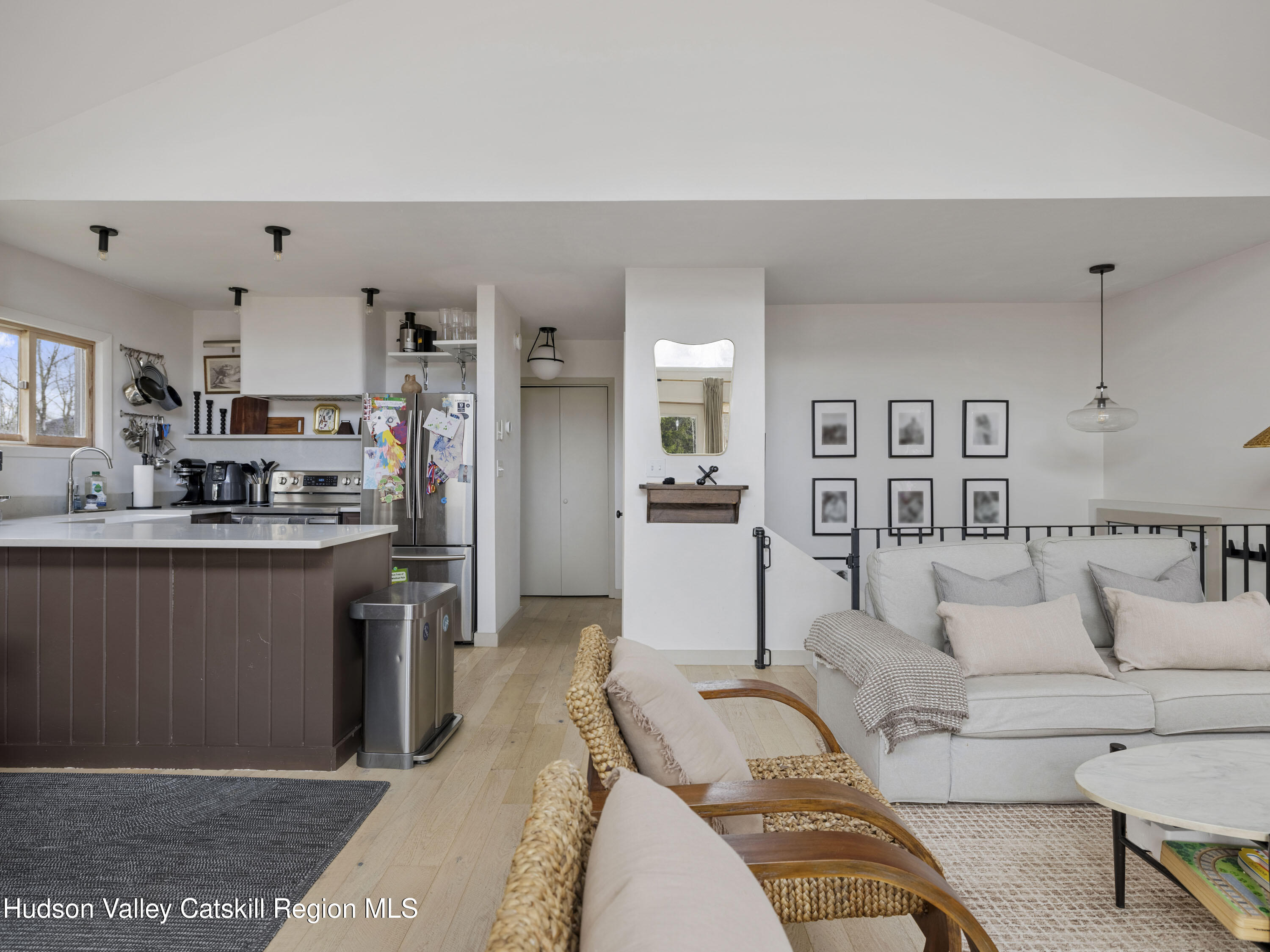 85 Bobillen Road Jewett, NY 12444 - Photo 11 of 59 a living room with stainless steel appliances furniture and a kitchen view