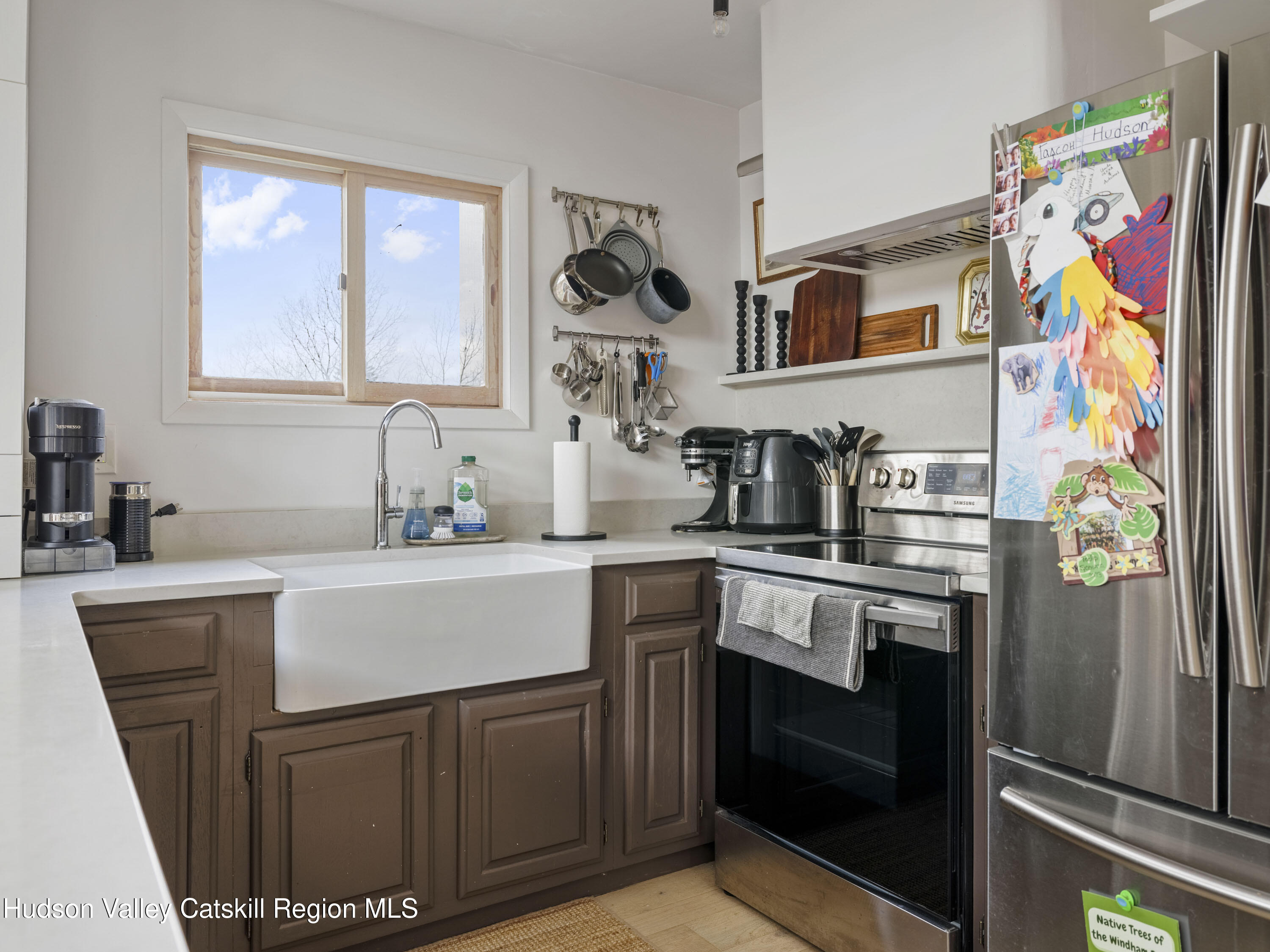 85 Bobillen Road Jewett, NY 12444 - Photo 15 of 59 a kitchen with stainless steel appliances granite countertop a refrigerator and a sink