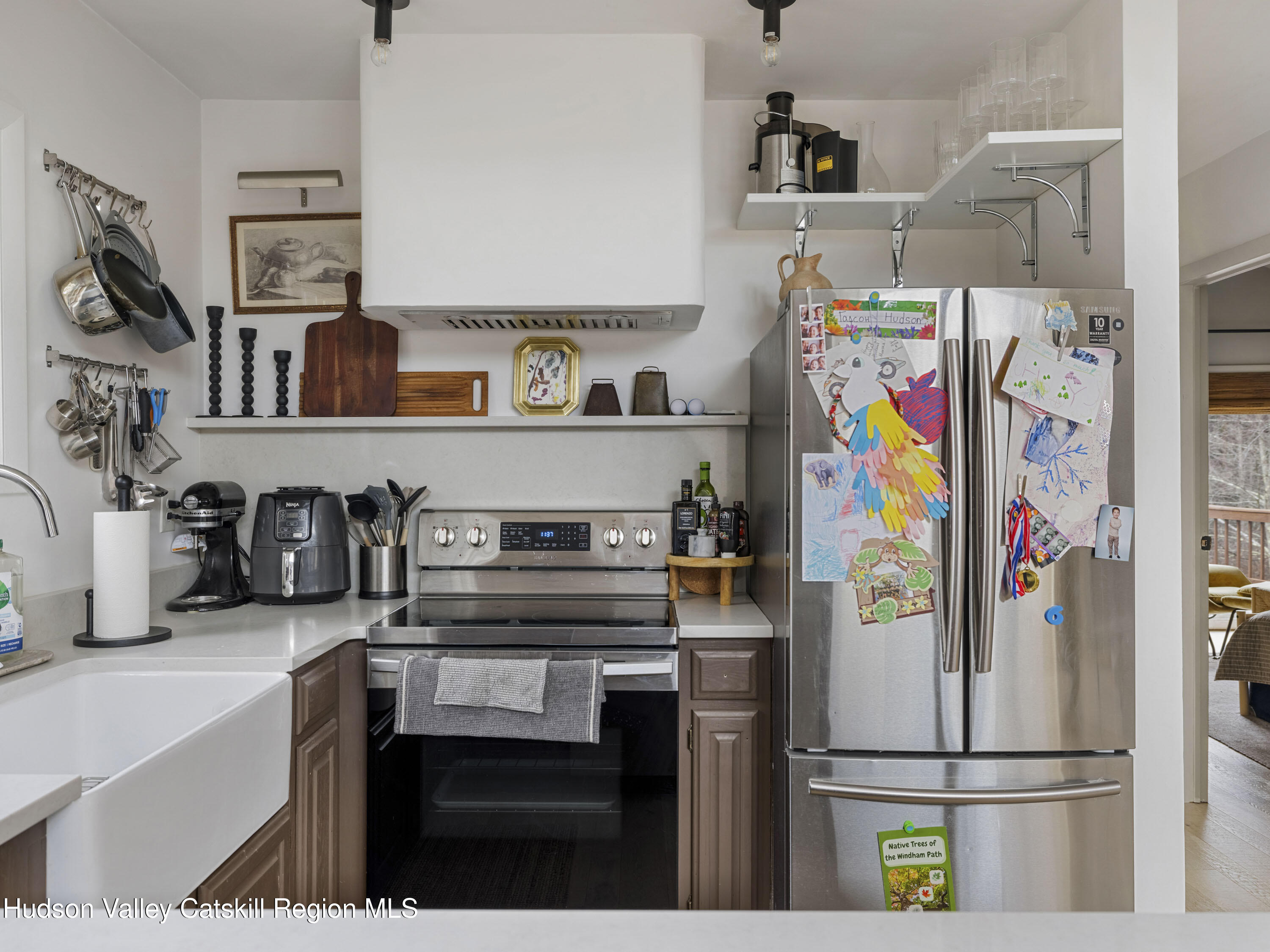 85 Bobillen Road Jewett, NY 12444 - Photo 16 of 59 a kitchen with stainless steel appliances a refrigerator and a sink