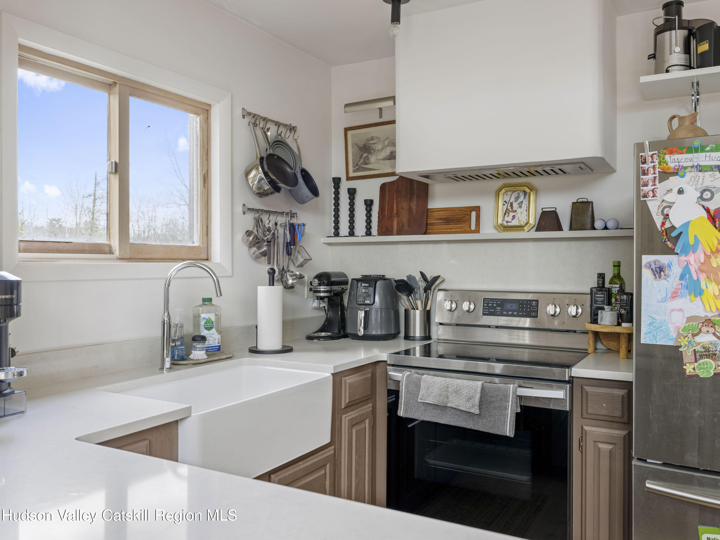 85 Bobillen Road Jewett, NY 12444 - Photo 17 of 59 a kitchen with stainless steel appliances granite countertop a sink and a stove