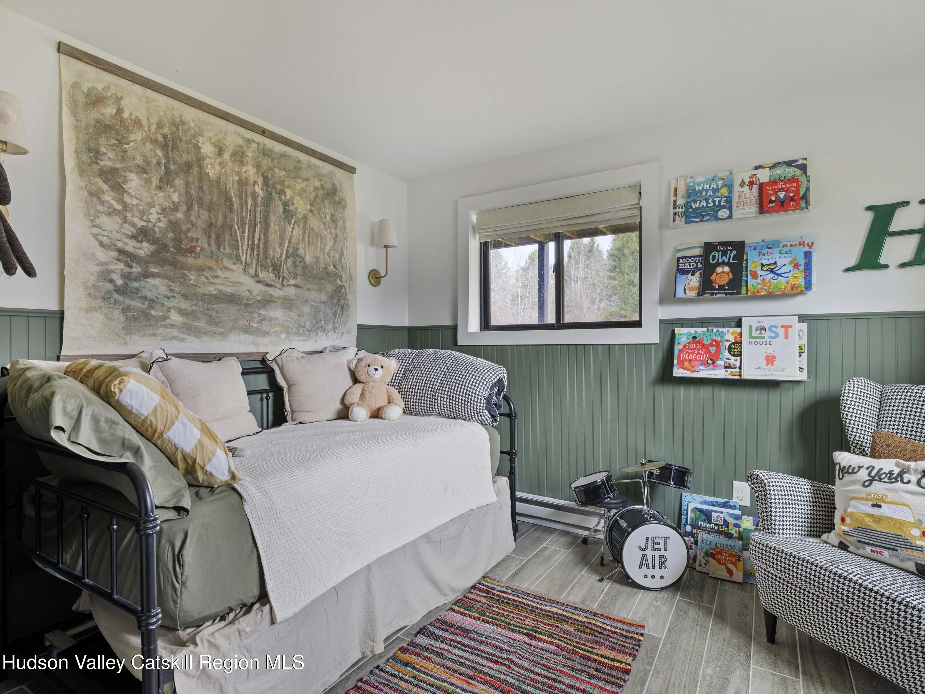 85 Bobillen Road Jewett, NY 12444 - Photo 25 of 59 a living room with furniture and a window