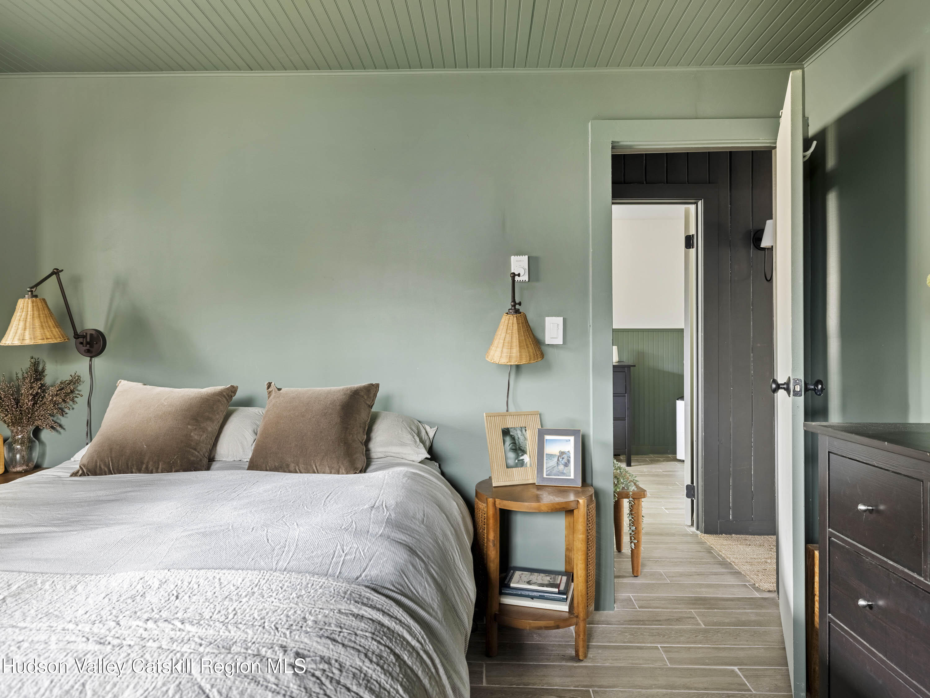 85 Bobillen Road Jewett, NY 12444 - Photo 31 of 59 a bedroom with a bed and a mirror on dresser