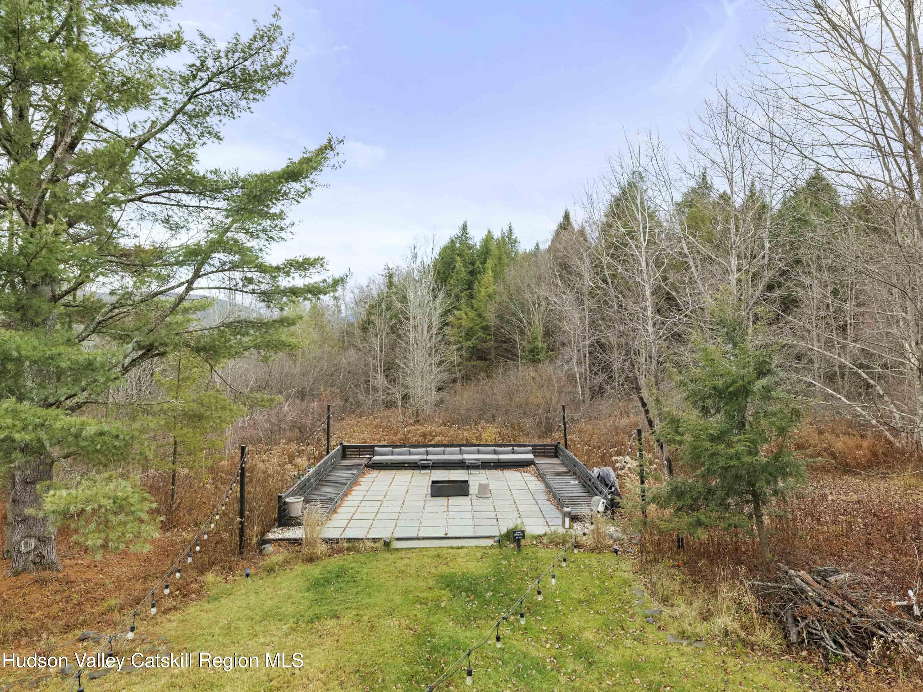 85 Bobillen Road Jewett, NY 12444 - Photo 52 of 59 a view of a yard with trees in front of it