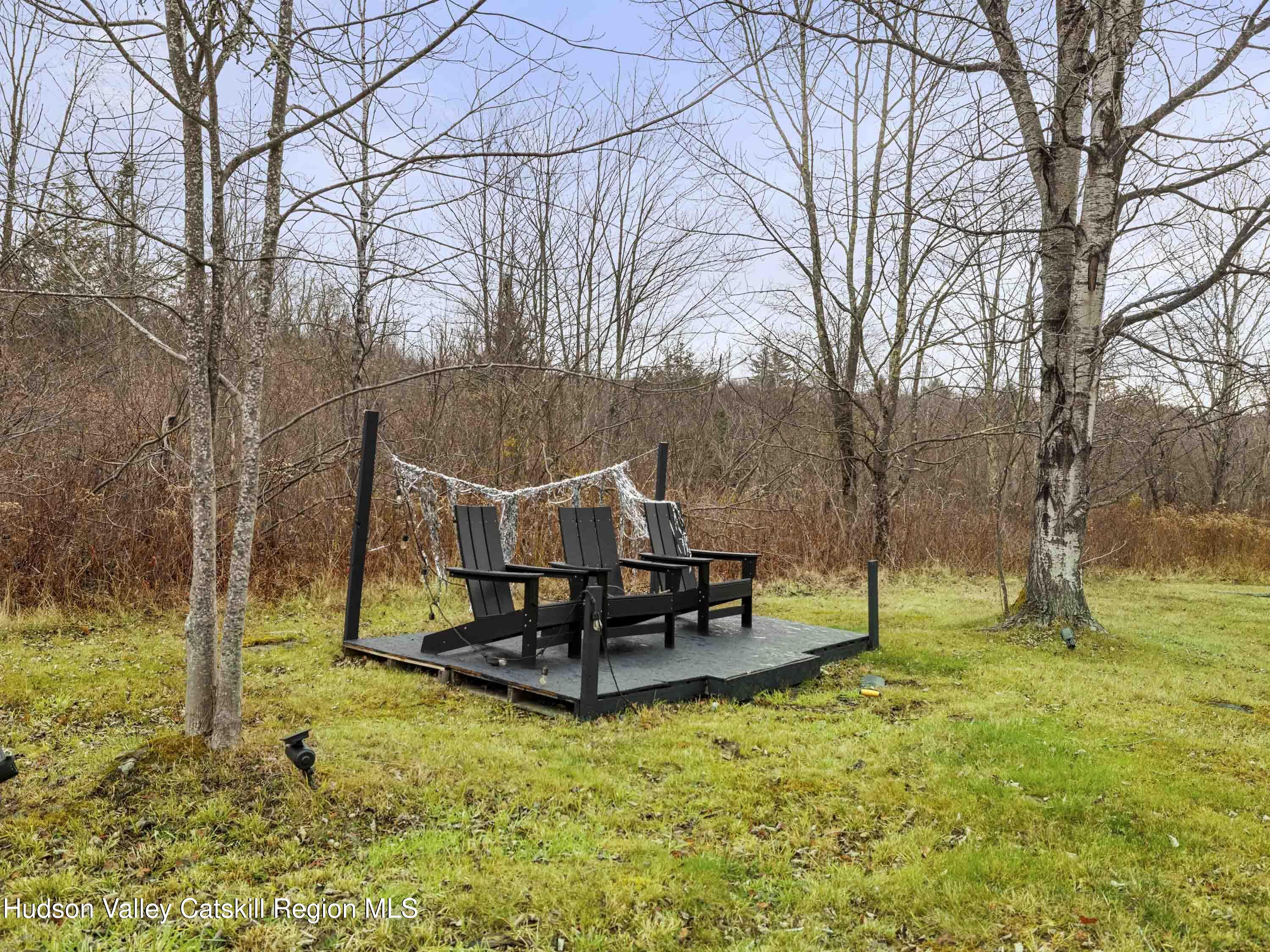 85 Bobillen Road Jewett, NY 12444 - Photo 54 of 59 a view of a garden with a bench