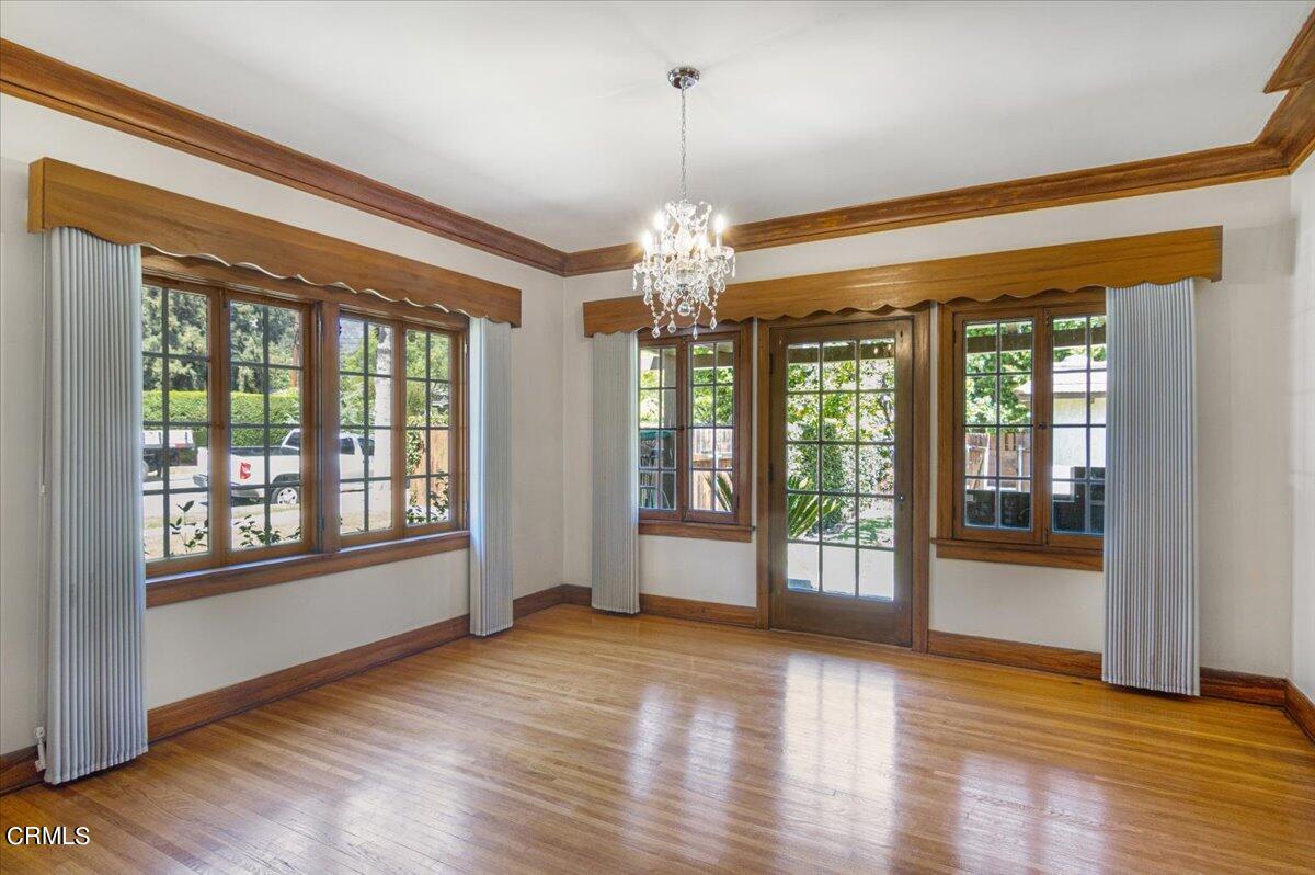 1136 East Rio Grande Street Pasadena, CA 91104 - Photo 11 of 30 a view of an empty room with wooden floor and a window
