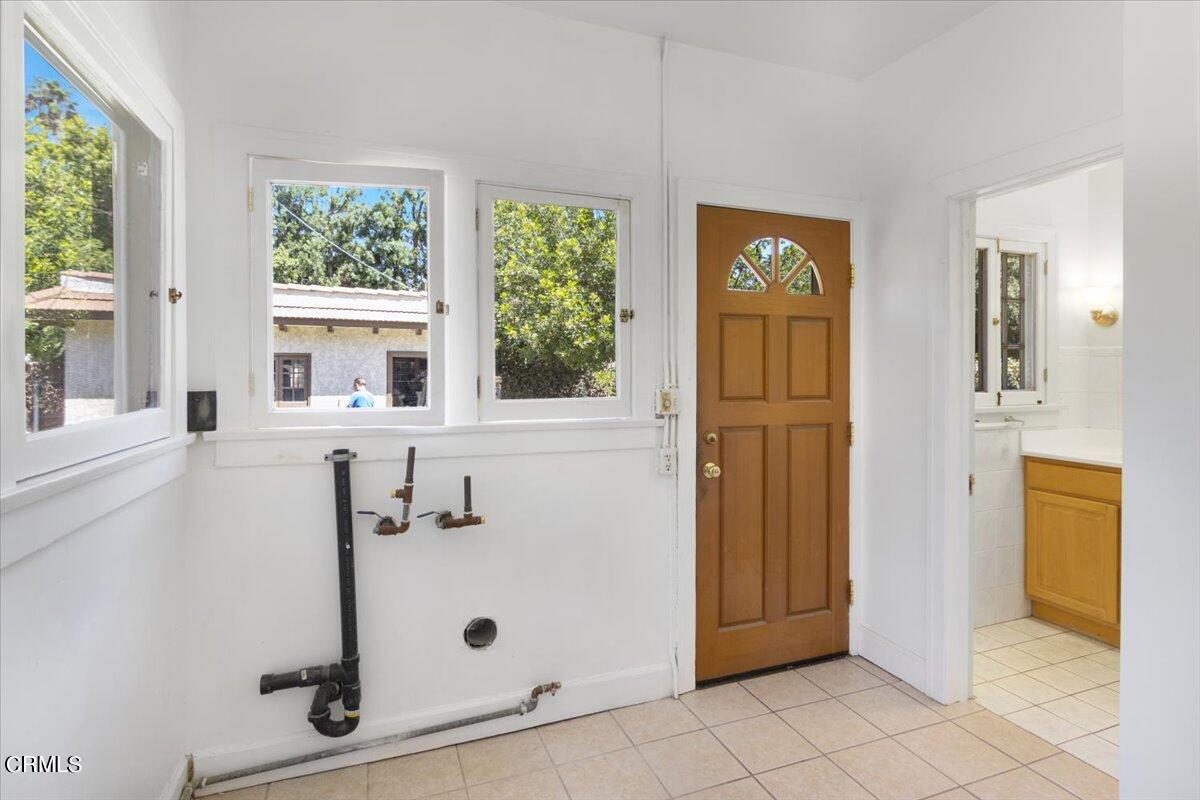 1136 East Rio Grande Street Pasadena, CA 91104 - Photo 15 of 30 a view of a entryway door with hallway