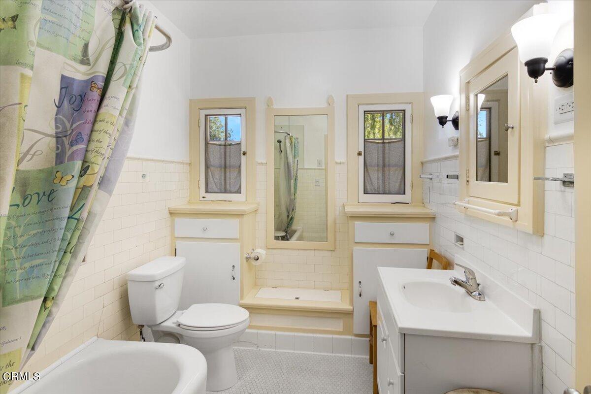 1136 East Rio Grande Street Pasadena, CA 91104 - Photo 20 of 30 a bathroom with a sink toilet and shower