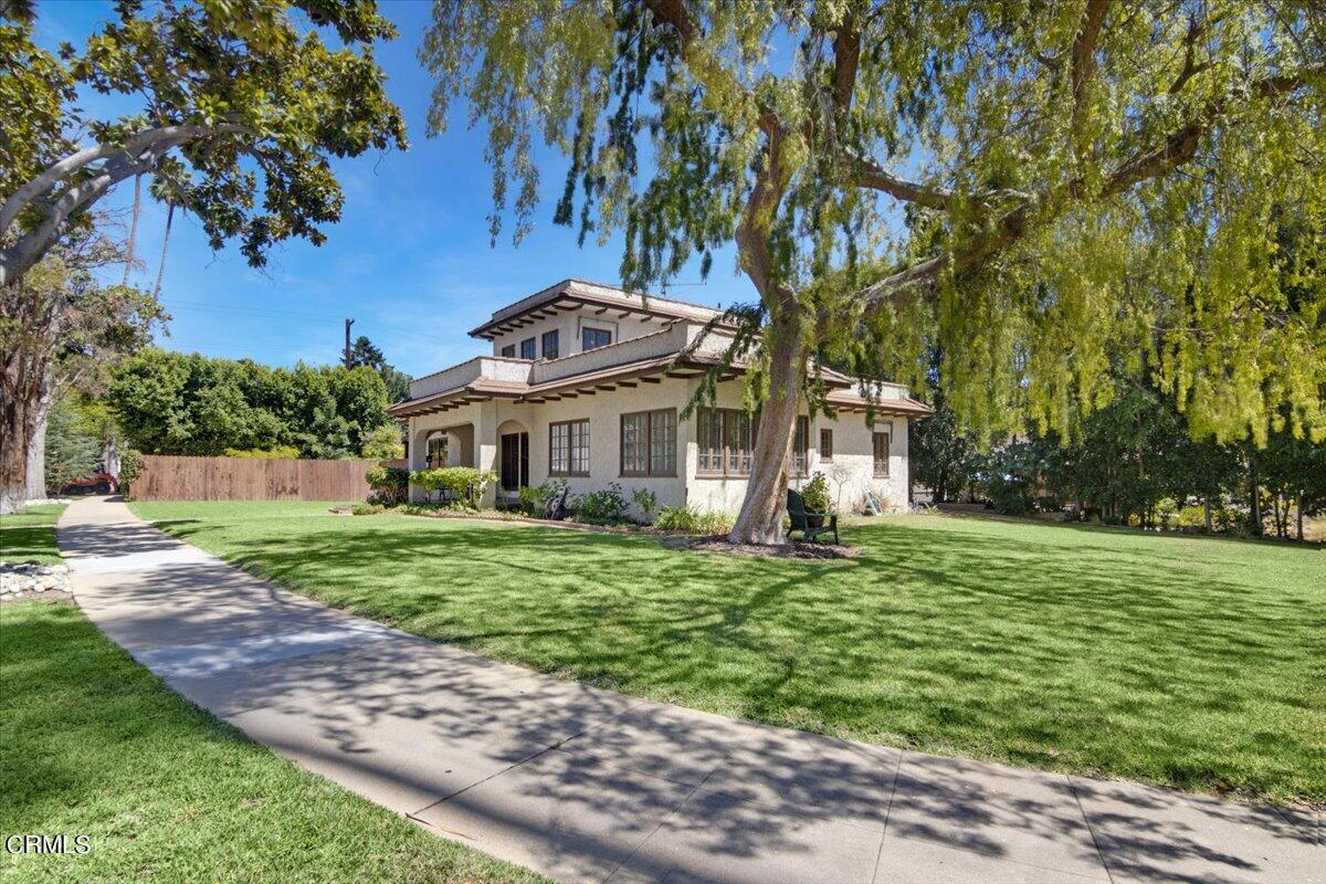1136 East Rio Grande Street Pasadena, CA 91104 - Photo 5 of 30 a front view of a house with a yard