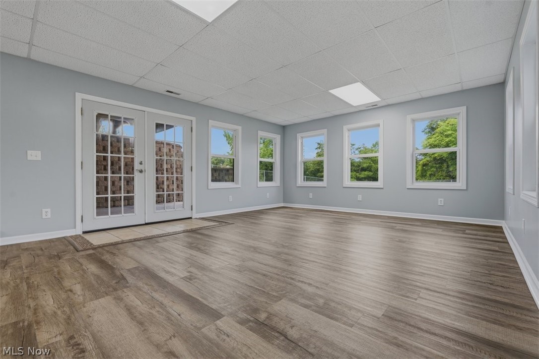 2575 Moody Ridge Road Vincent, OH 45784 - Photo 31 of 48 Walls of windows makes this lower level space bright & cheery