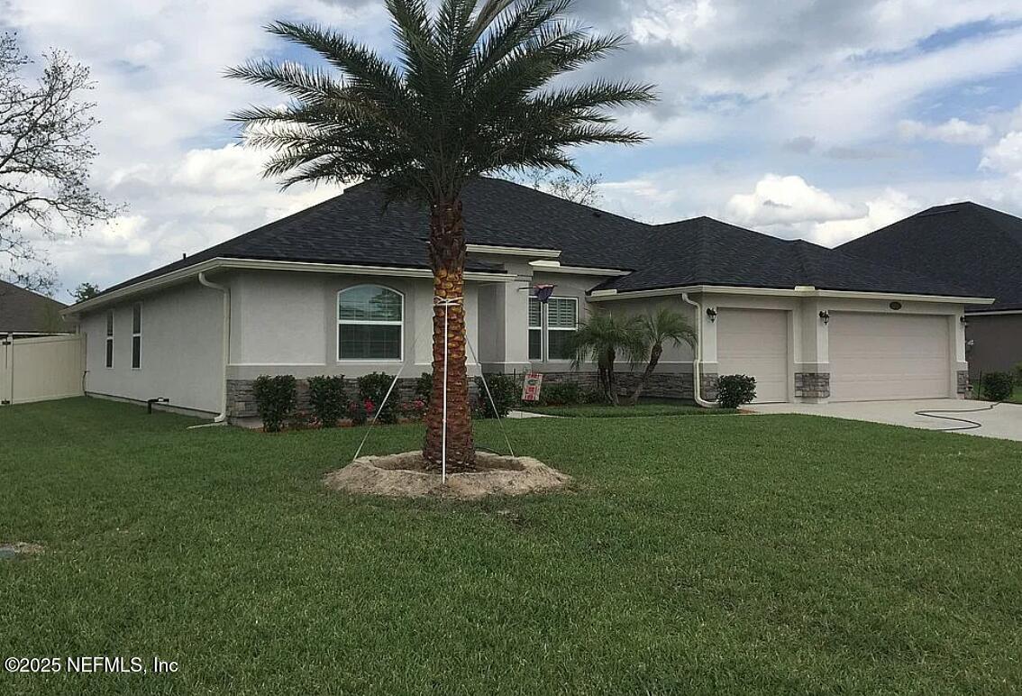 a house that has a garden in front of it