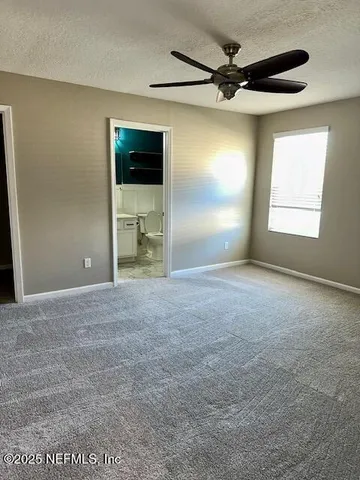 a view of a livingroom with a flat screen tv