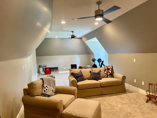 a bath tub sitting in a bathroom next to a window