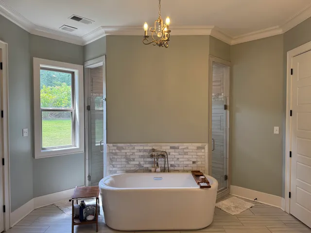 a bathroom with a sink vanity and a mirror