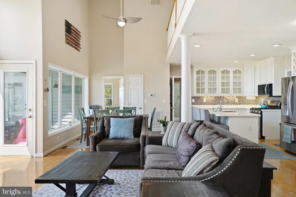 a view of living room with furniture and flat screen tv