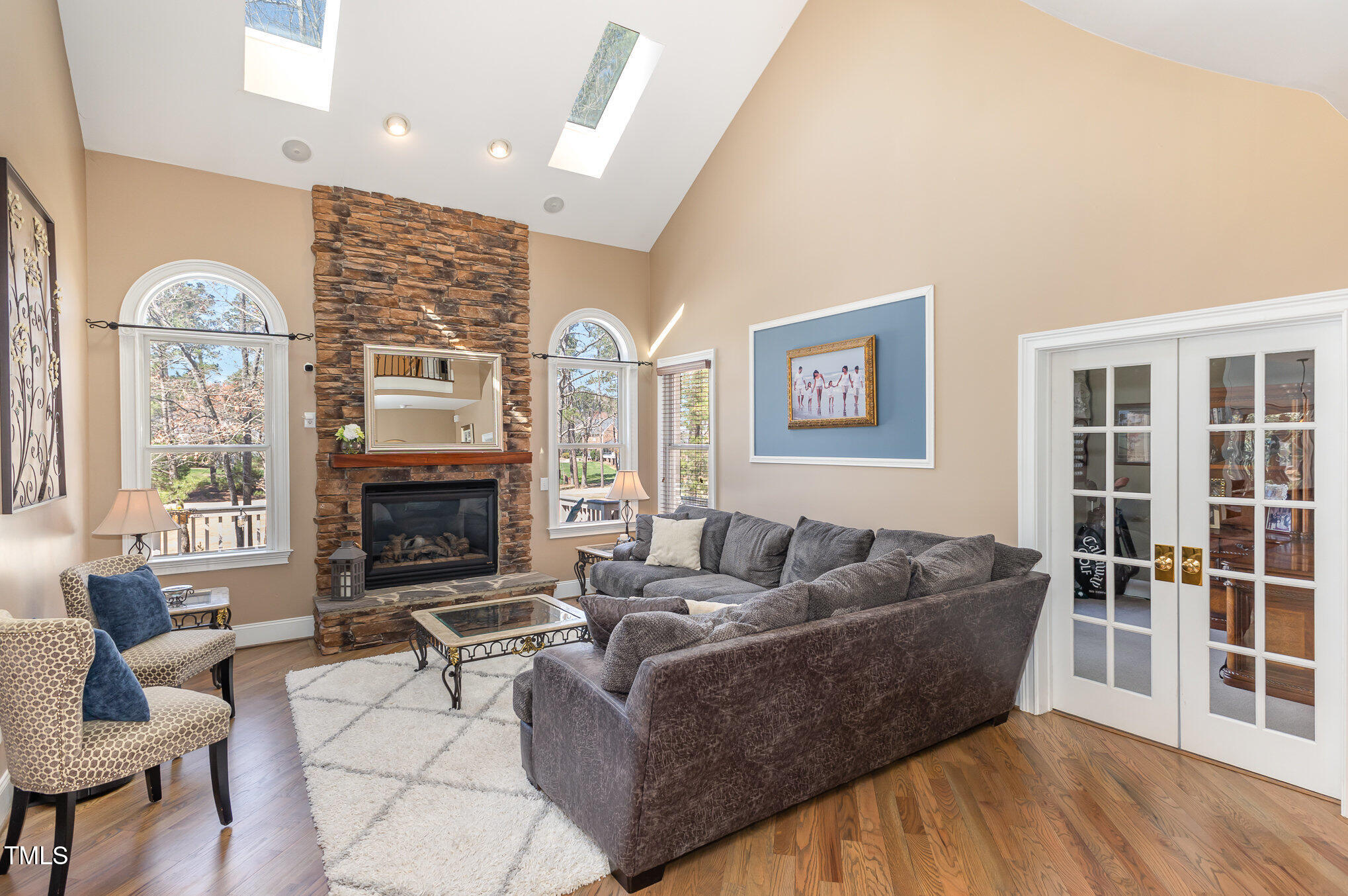 10841 Round Brook Circle Raleigh, NC 27617 - Photo 11 of 44 a living room with furniture and a fireplace