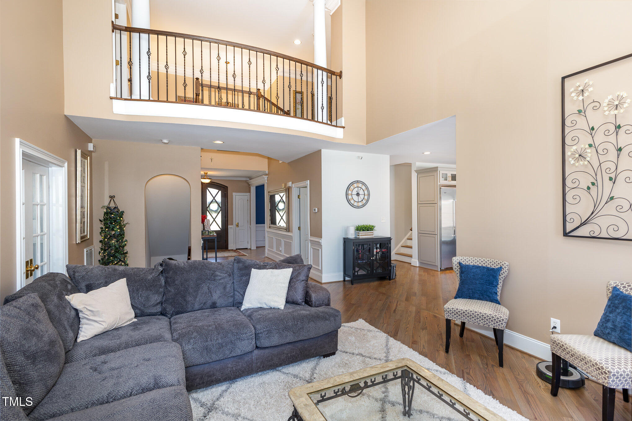 10841 Round Brook Circle Raleigh, NC 27617 - Photo 12 of 44 a living room with furniture and a large window