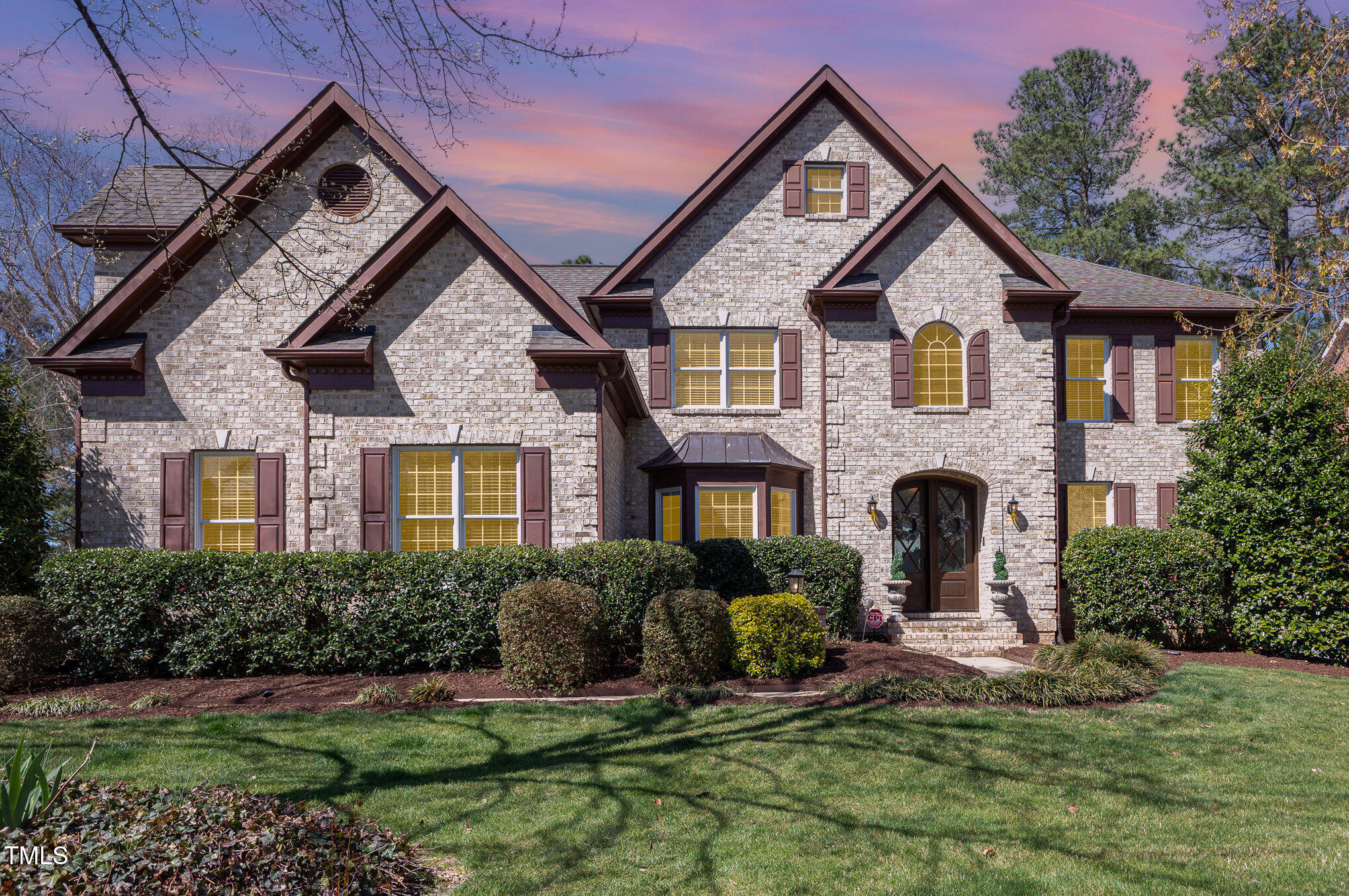 10841 Round Brook Circle Raleigh, NC 27617 - Photo 13 of 44 a front view of a house with a yard