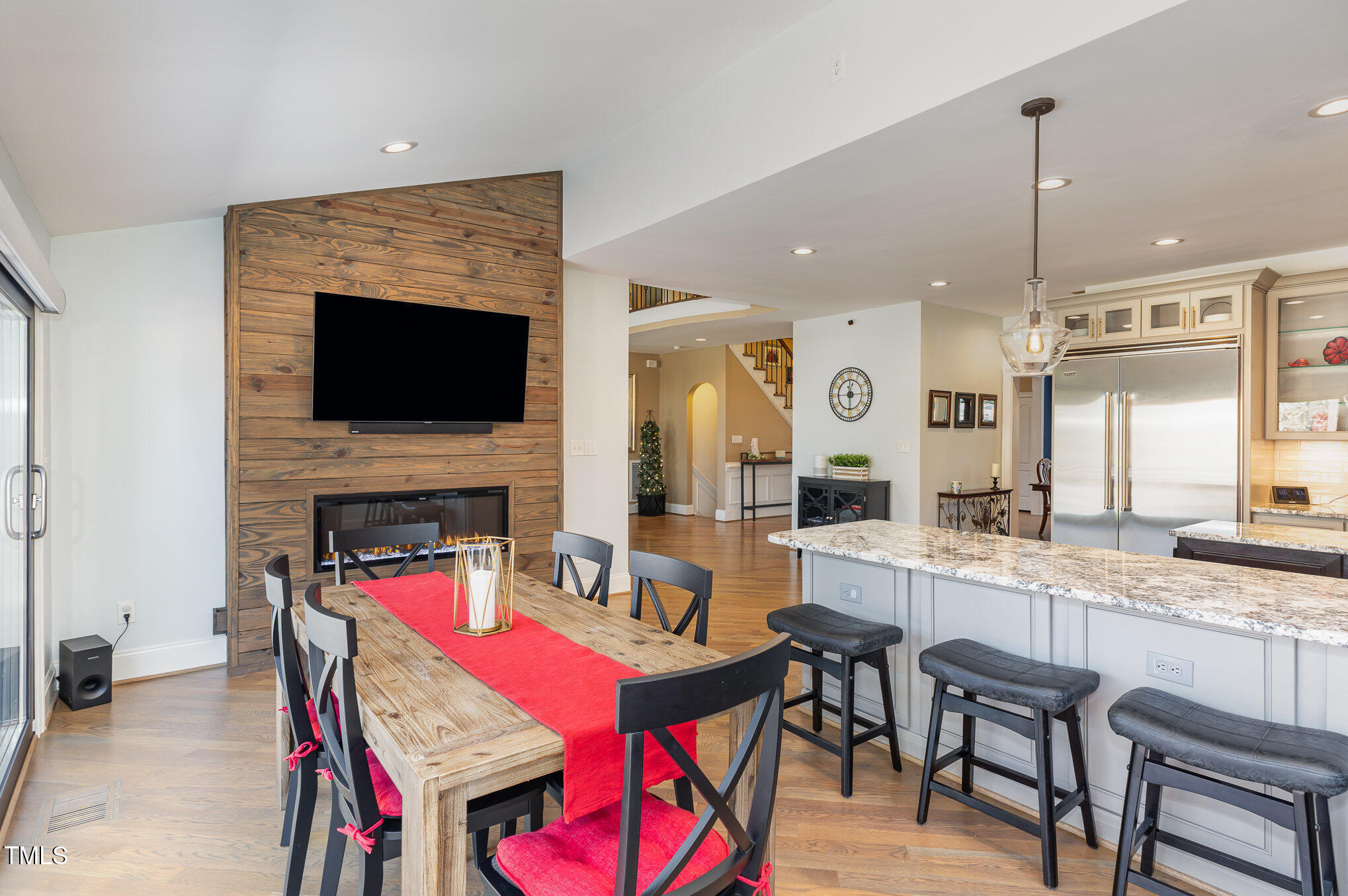 10841 Round Brook Circle Raleigh, NC 27617 - Photo 15 of 44 a living room with fireplace furniture and a flat screen tv