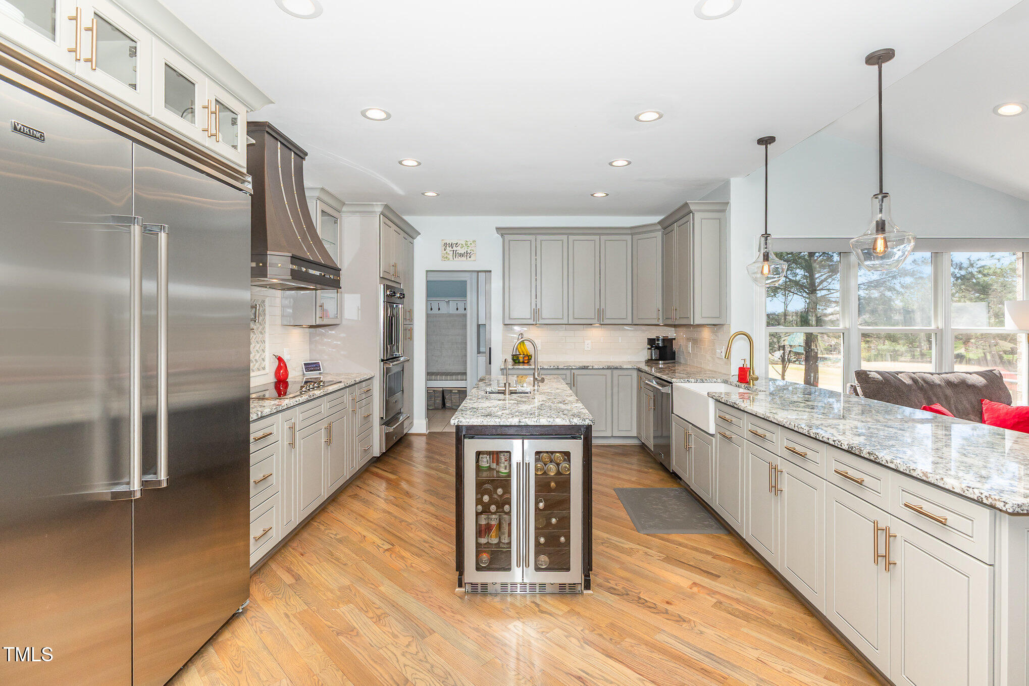 10841 Round Brook Circle Raleigh, NC 27617 - Photo 17 of 44 a kitchen with stainless steel appliances granite countertop a sink a stove and a refrigerator