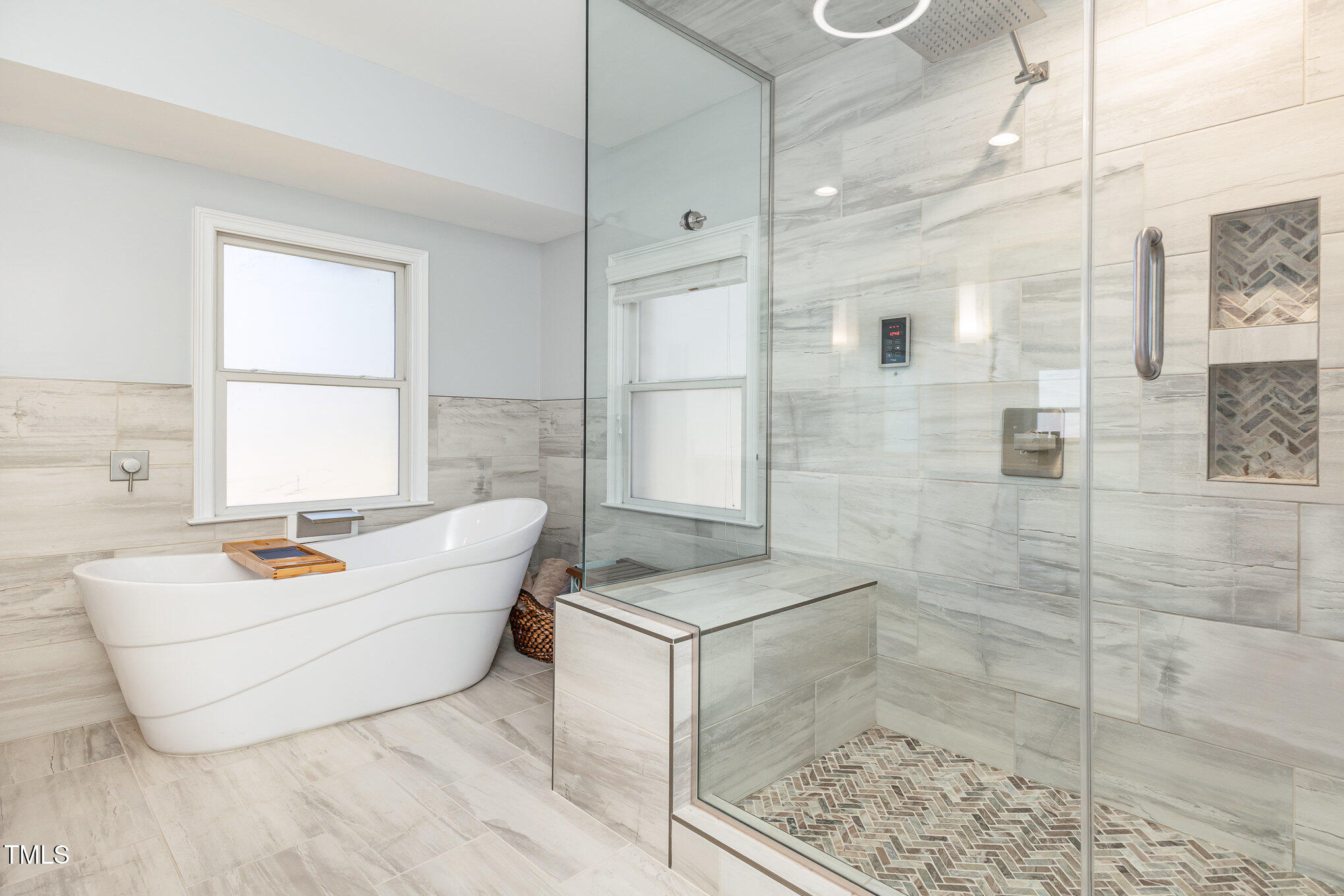 10841 Round Brook Circle Raleigh, NC 27617 - Photo 23 of 44 a living room with stainless steel appliances kitchen island granite countertop furniture and a fireplace