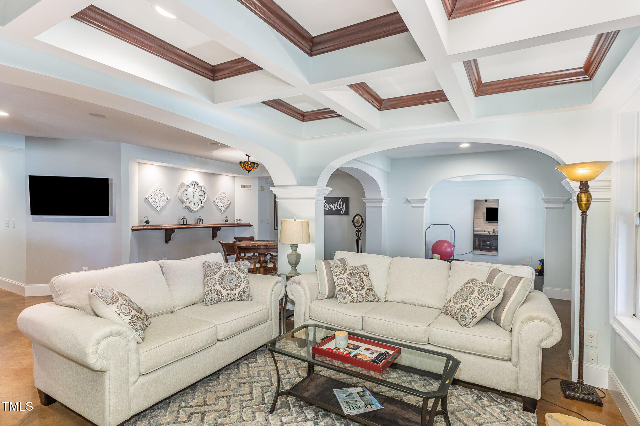 10841 Round Brook Circle Raleigh, NC 27617 - Photo 29 of 44 a living room with furniture and a flat screen tv
